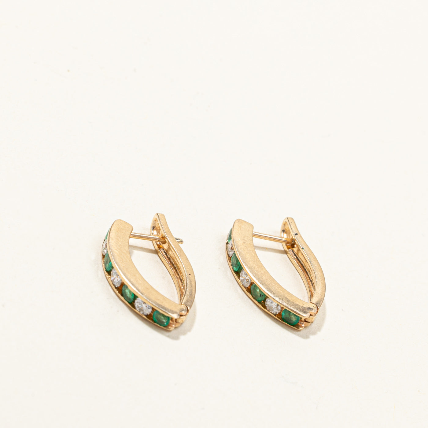 Channel Set Emerald & Diamond Huggie Earrings | 0.38ctw | 0.24ctw |