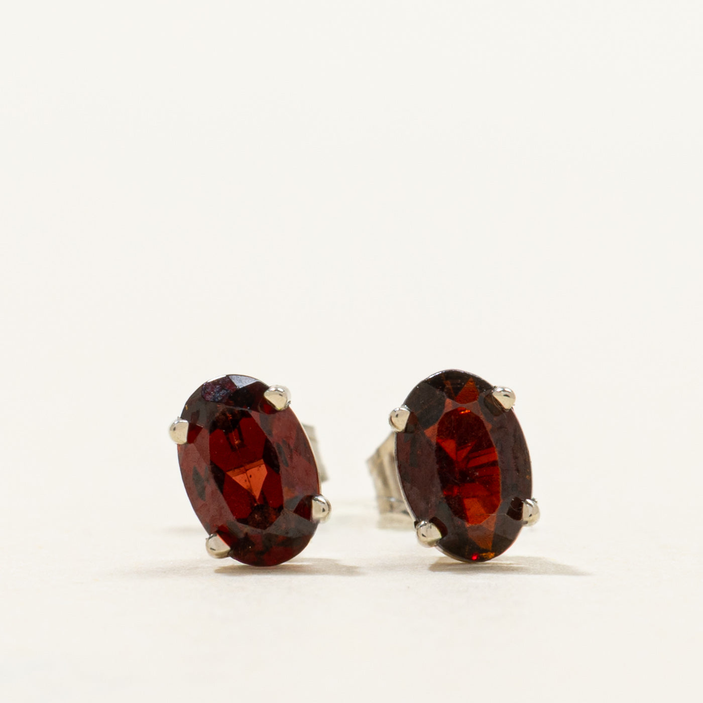 '100 Ways' Oval Cut Garnet Solitaire Stud Earrings | 1.05ctw