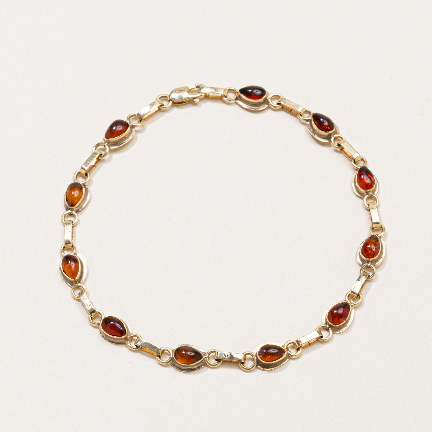 Bezel Set Pear Cabochon Amber Gemstone Bracelet | 8"