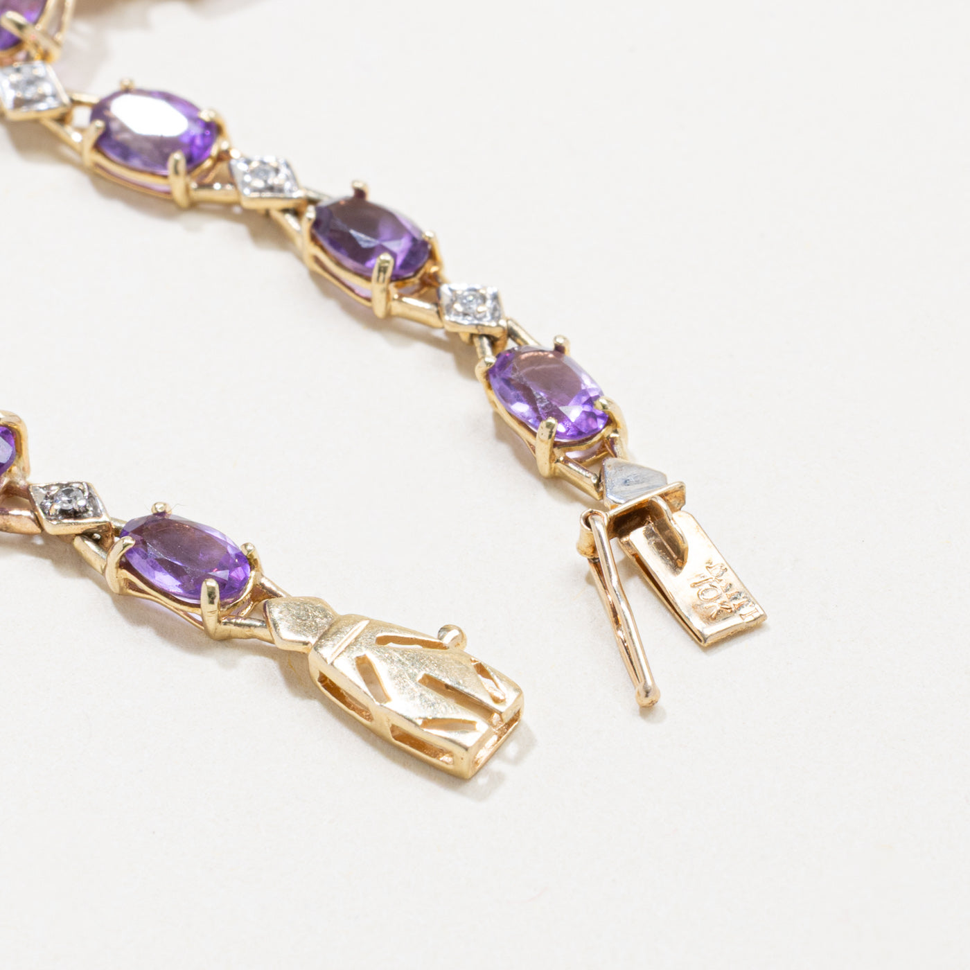 Oval Cut Amethyst & Diamond Gemstone Bracelet | 7.5"