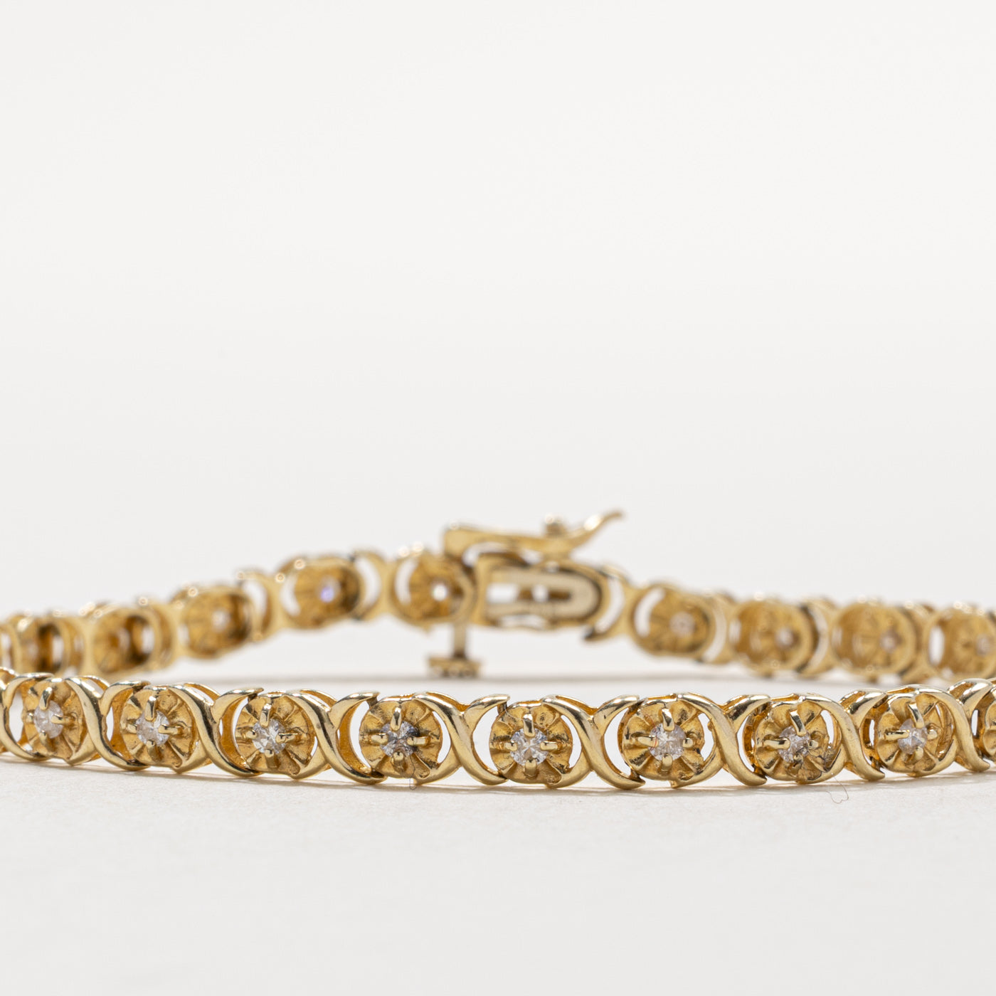 14k Illusion Set Diamond X Tennis Bracelet | 0.25ct | 7"