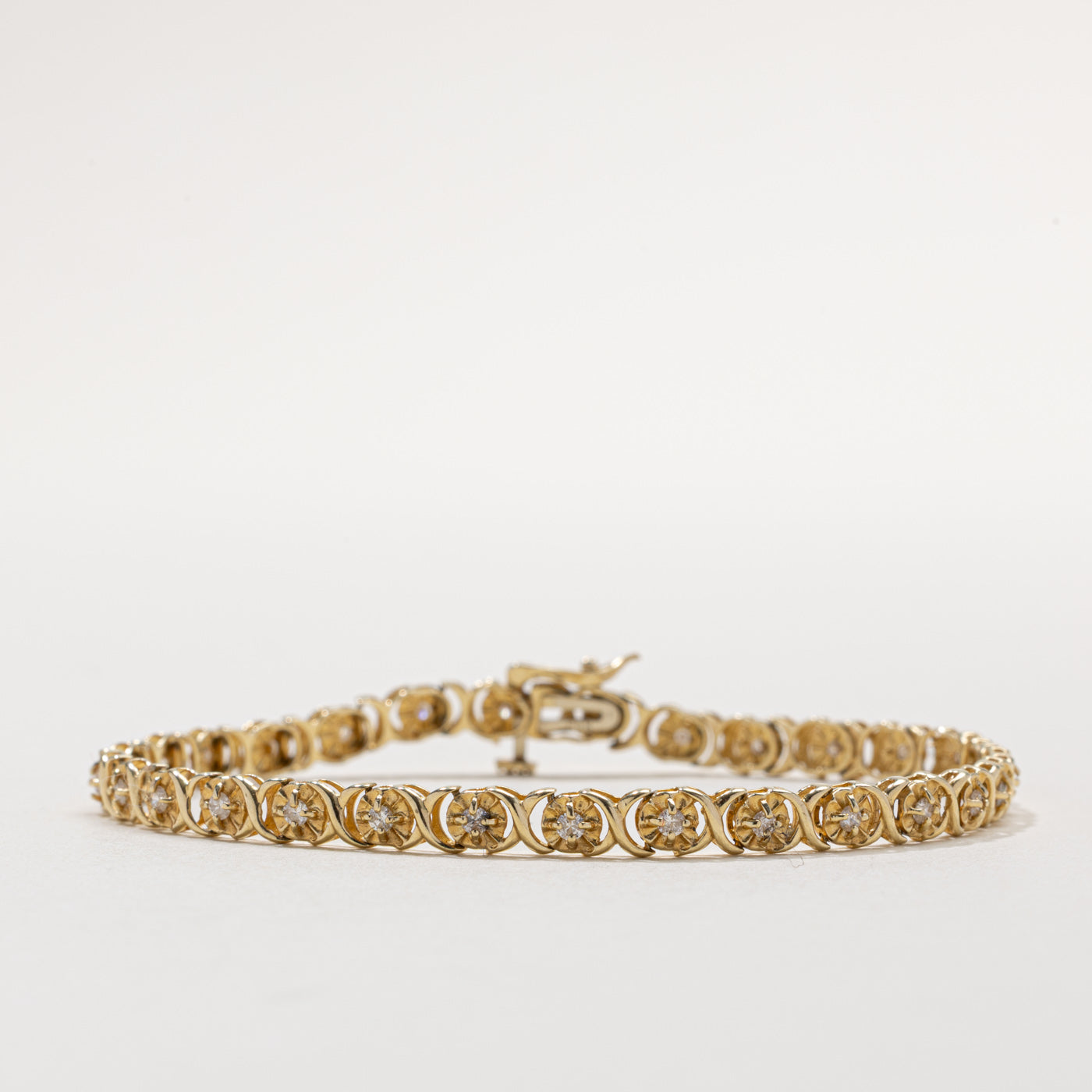 14k Illusion Set Diamond X Tennis Bracelet | 0.25ct | 7"