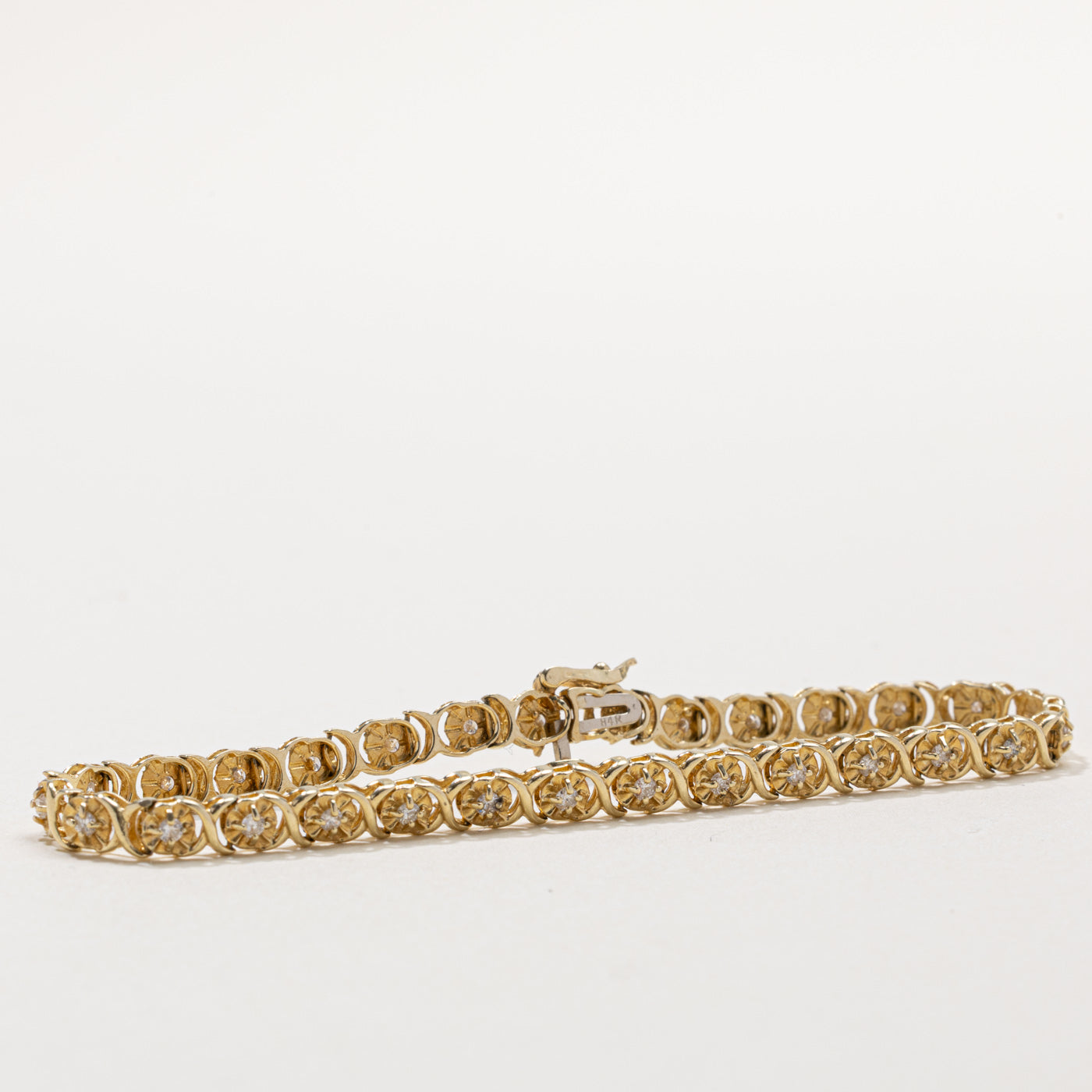 14k Illusion Set Diamond X Tennis Bracelet | 0.25ct | 7"