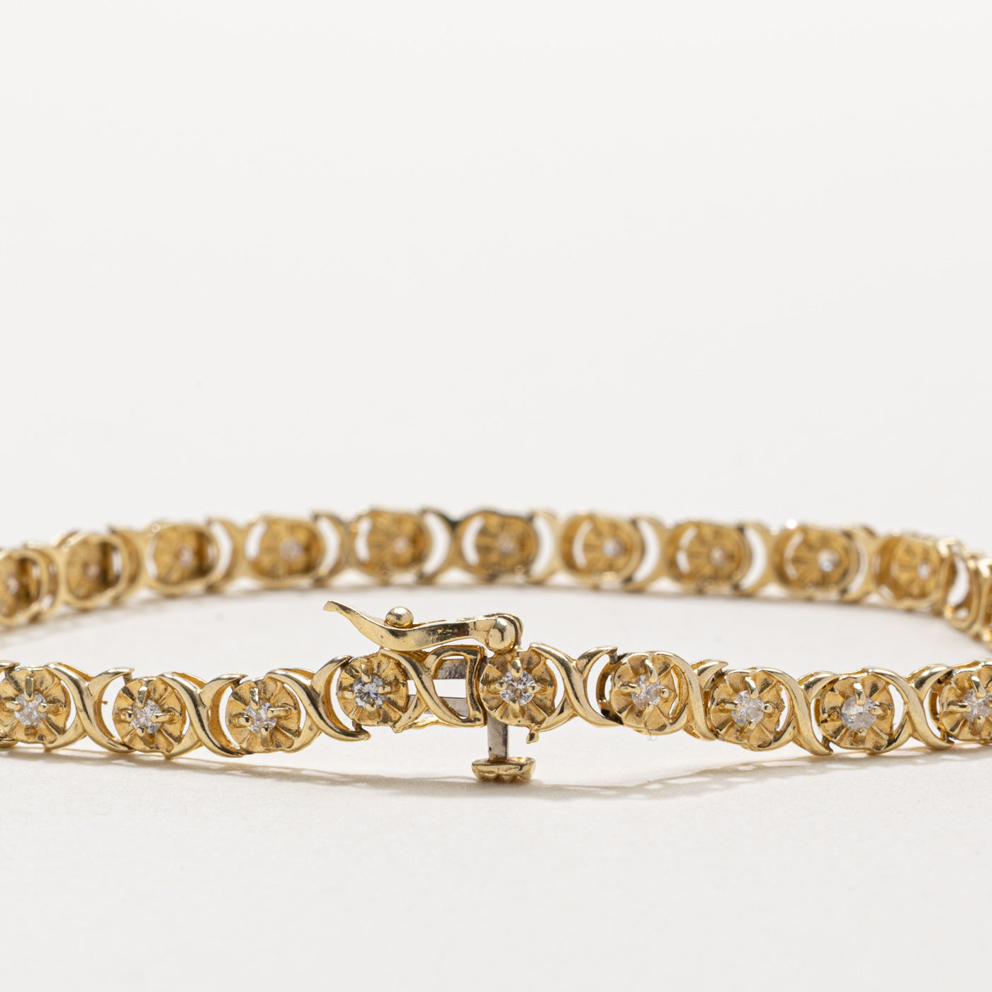 14k Illusion Set Diamond X Tennis Bracelet | 0.25ct | 7"