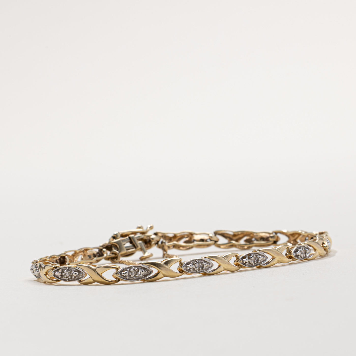 10k Diamond Geometric X Tennis Bracelet | 0.07ct | 7"