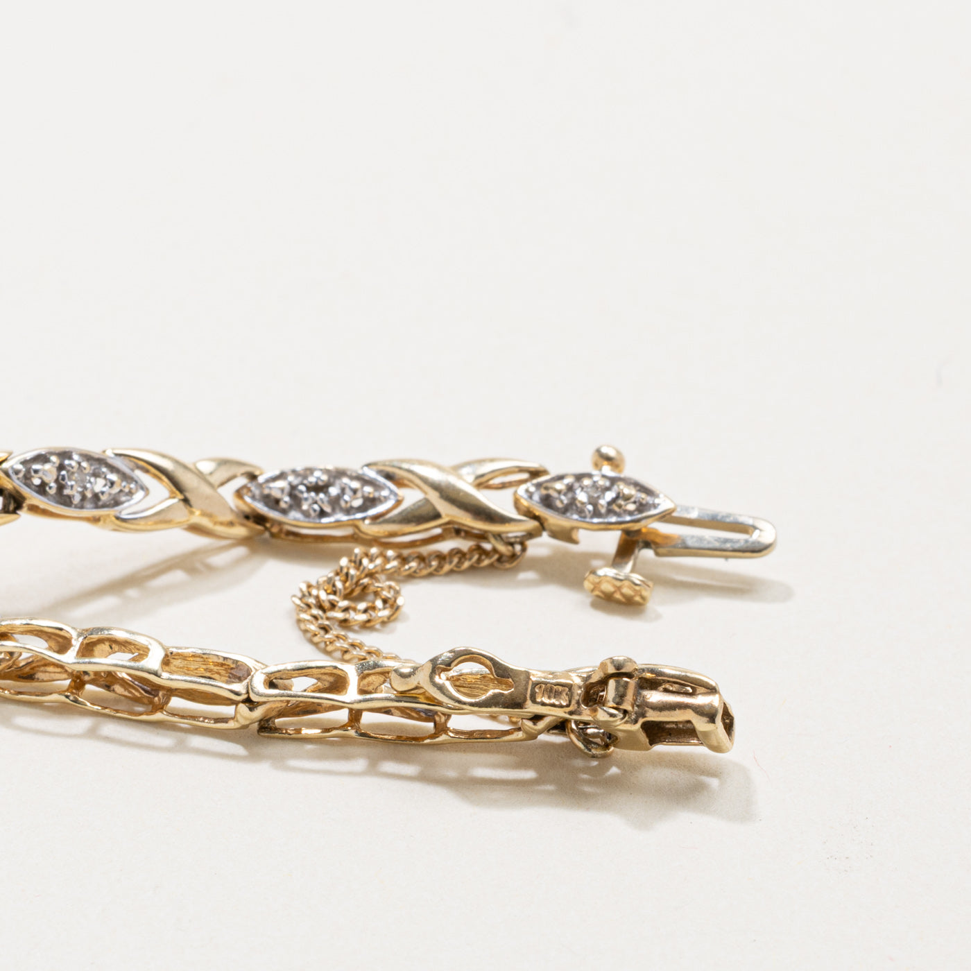 10k Diamond Geometric X Tennis Bracelet | 0.07ct | 7"