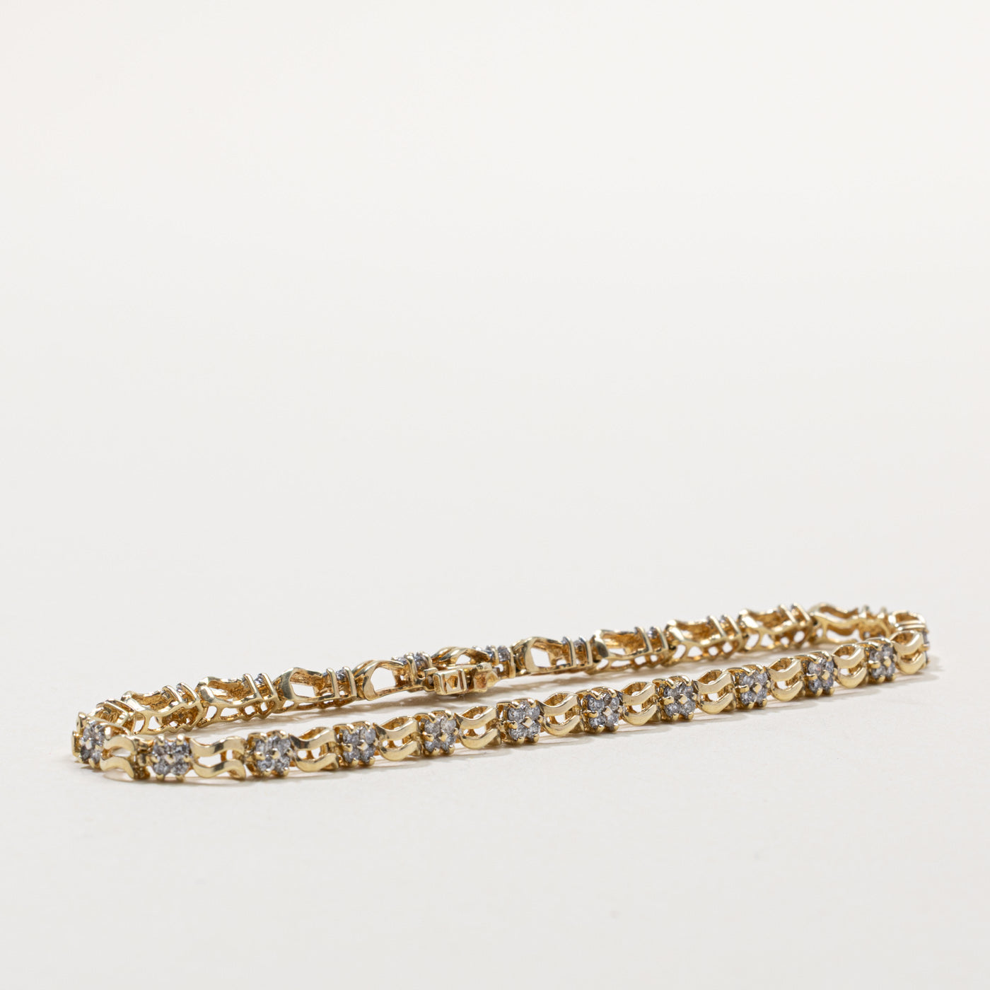 10k Diamond Cluster Wave Tennis Bracelet | 0.48ct | 7"
