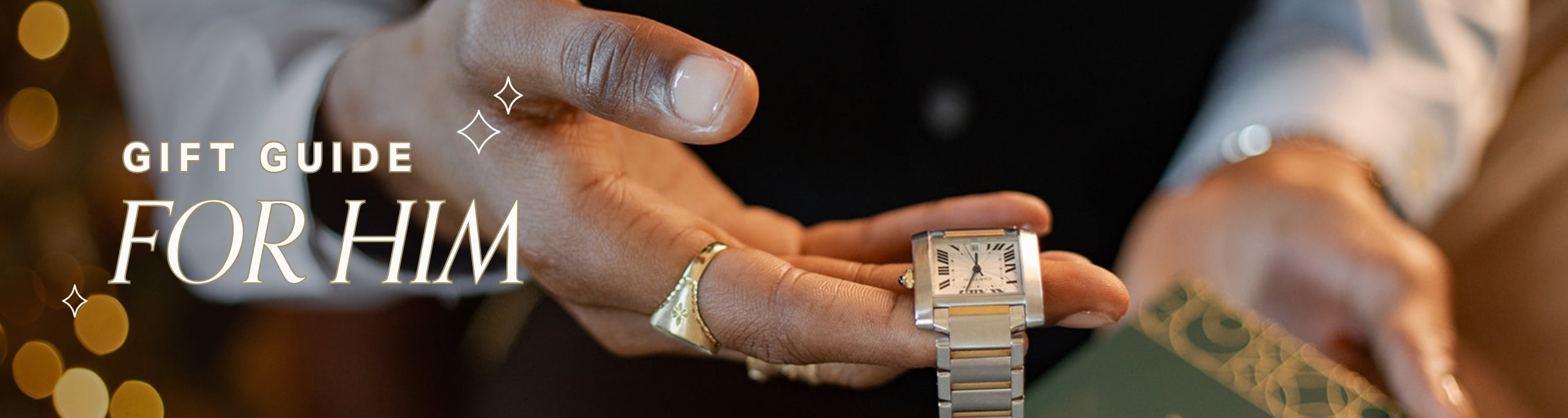 Man holding a watch with text 'Gift Guide for Him' on a soft holiday background