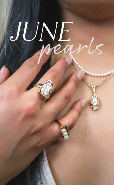 Image of hand wearing a vintage, baroque abstract pearl ring and necklace, as well as modern, minimal pearl jewelry. Text reads: June Pearls