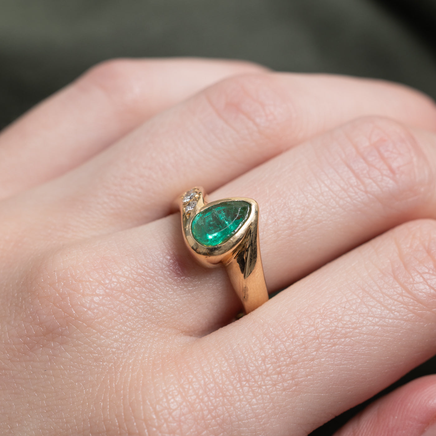 Bezel Set Pear Cut Emerald & Diamond Bypass Ring | 0.8ct, 0.04ctw | SZ 7.0 |