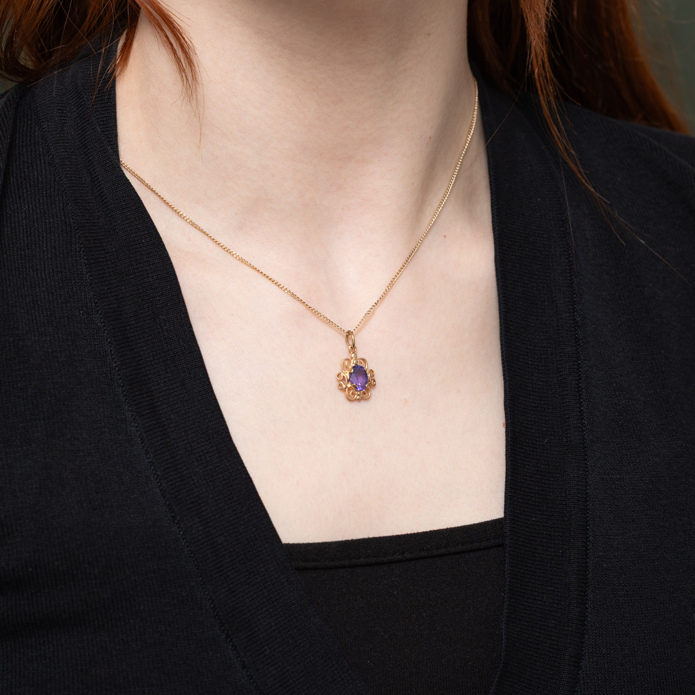 Oval Cut Amethyst Scrollwork Pendant