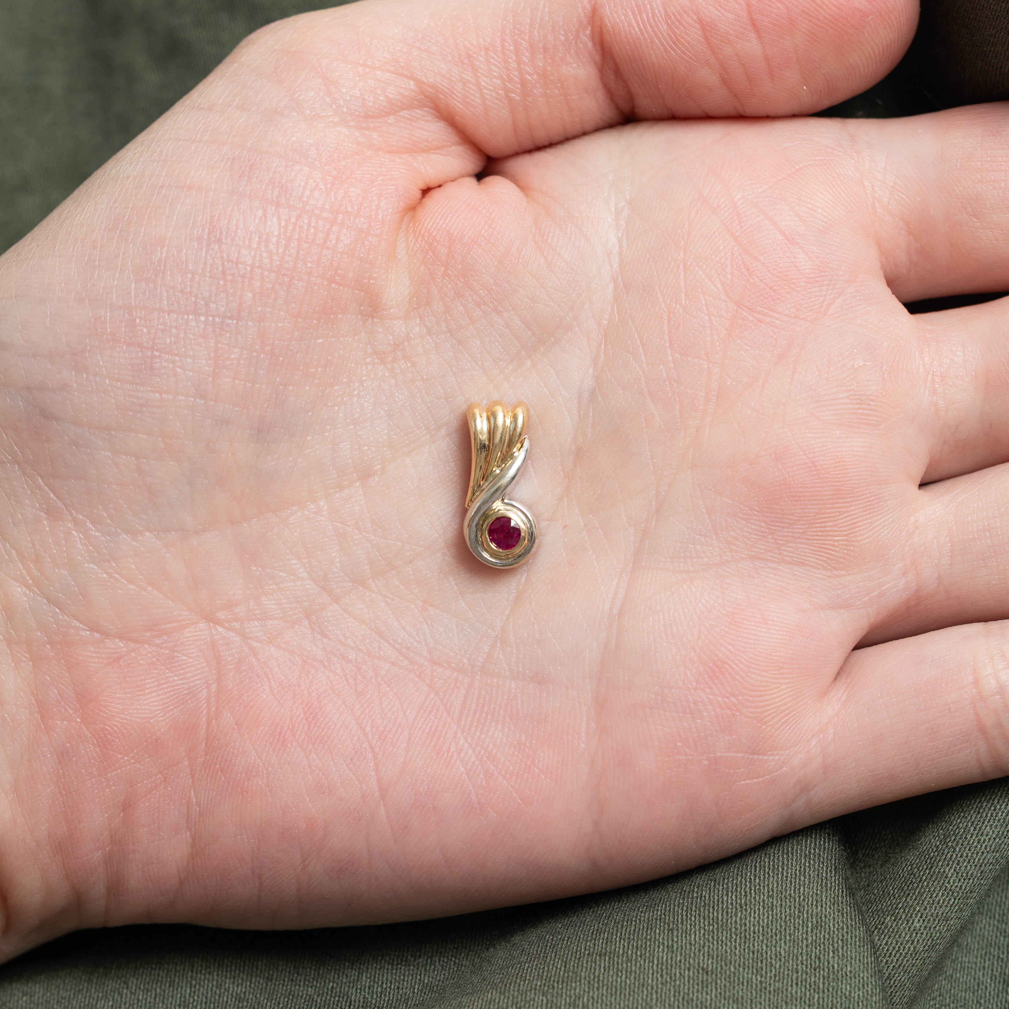 10k Bezel Set Ruby Swirl Pendant