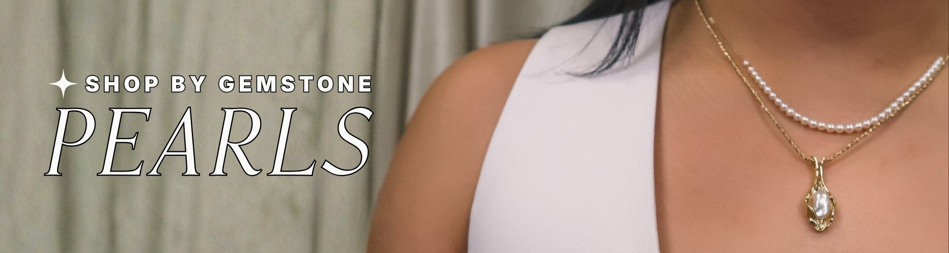 Layered Pearl necklaces, one simple pearl strand and one bold baroque pearl pendant with organic gold setting being worn by a woman with white vest, text overlay reads: 'Shop by Gemstone: Pearls' 