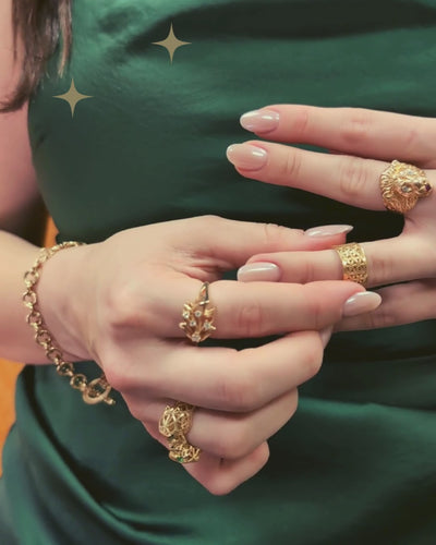 Video of model putting on yellow gold lattice ring