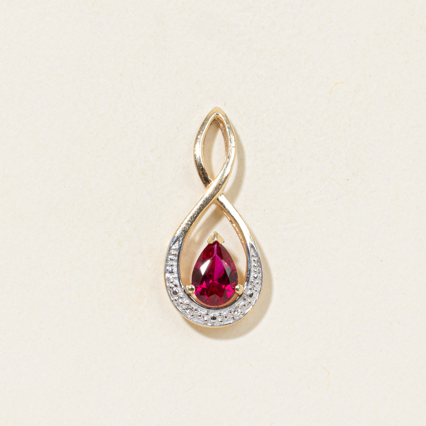 Pear Cut Synthetic Ruby & Diamond Crossover Pendant
