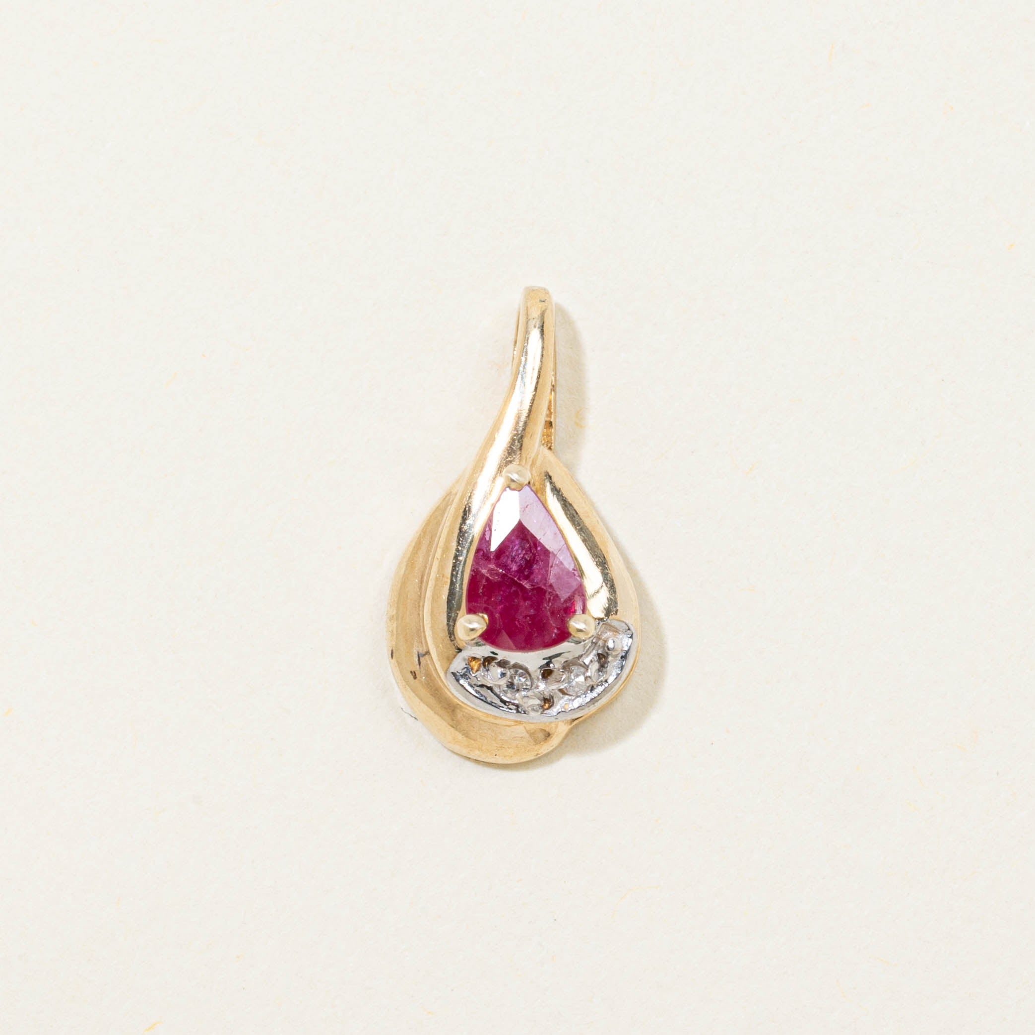 10k Pear Cut Ruby & Diamond Accented Pendant