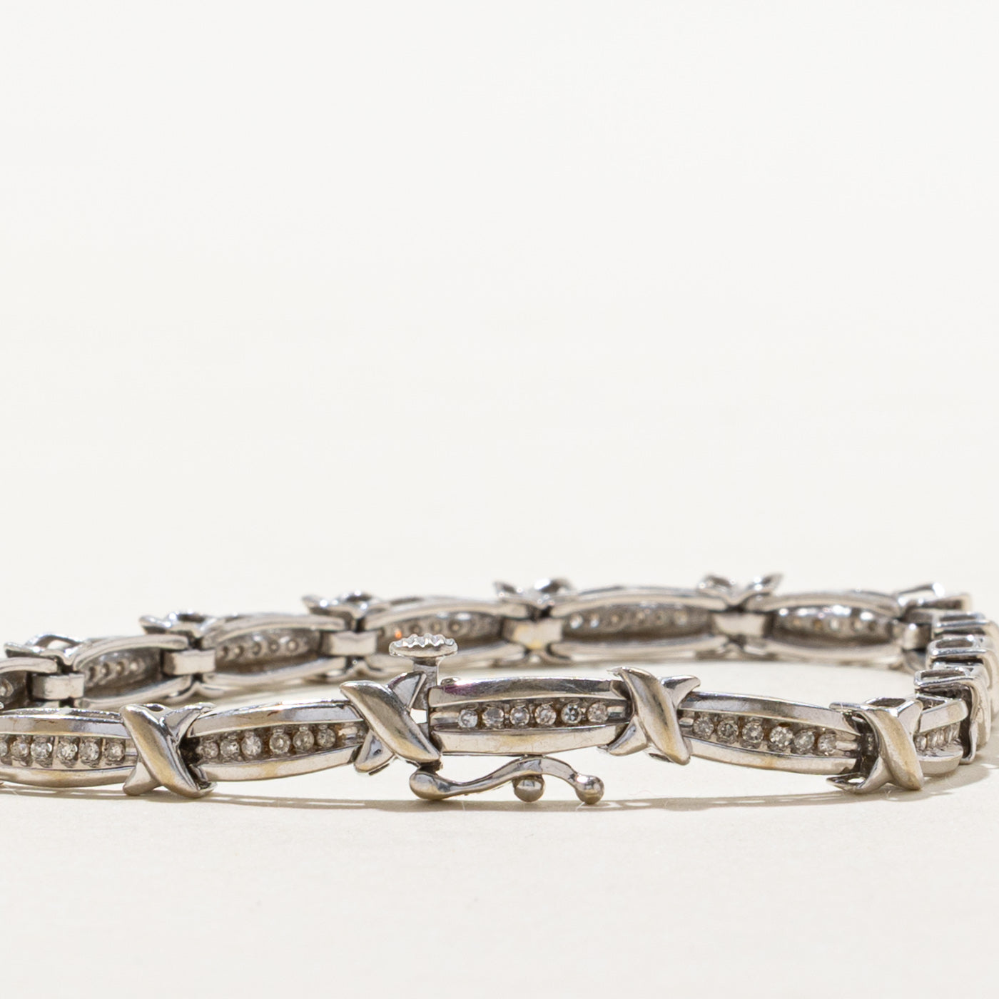 Channel Set Diamond X Tennis Bracelet | 0.45ctw | SZ 7.5" |