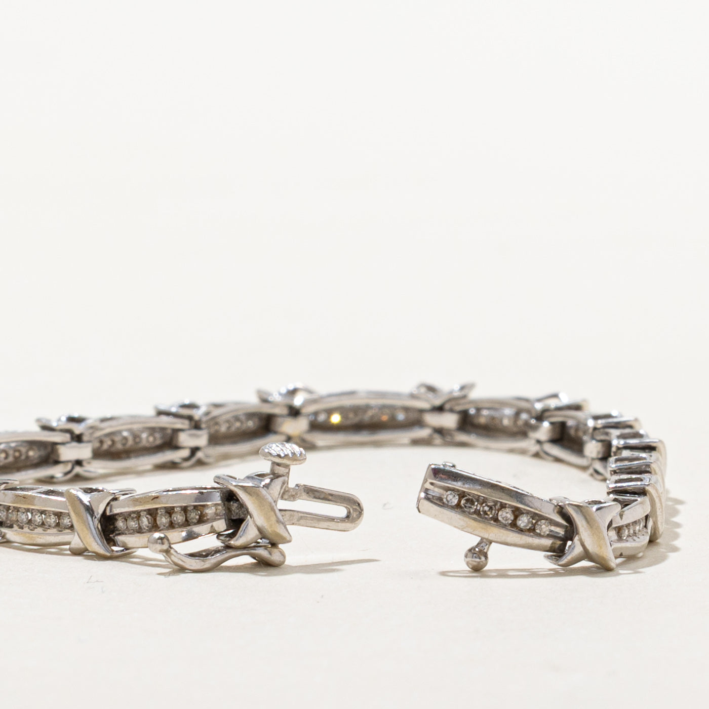 Channel Set Diamond X Tennis Bracelet | 0.45ctw | SZ 7.5" |