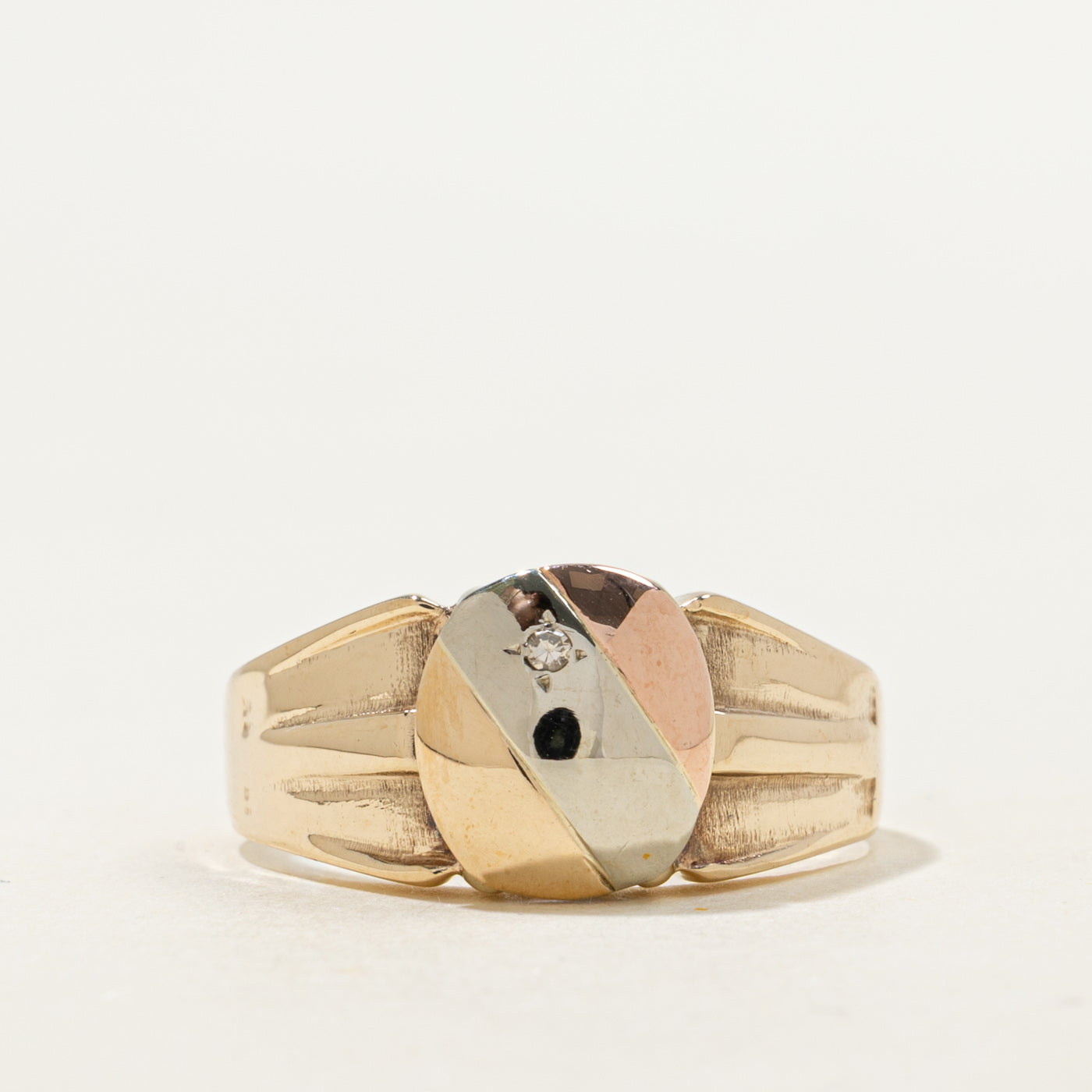 Bague rainurée en or tricolore sertie de diamants | 0,007 ct | Taille 10,25