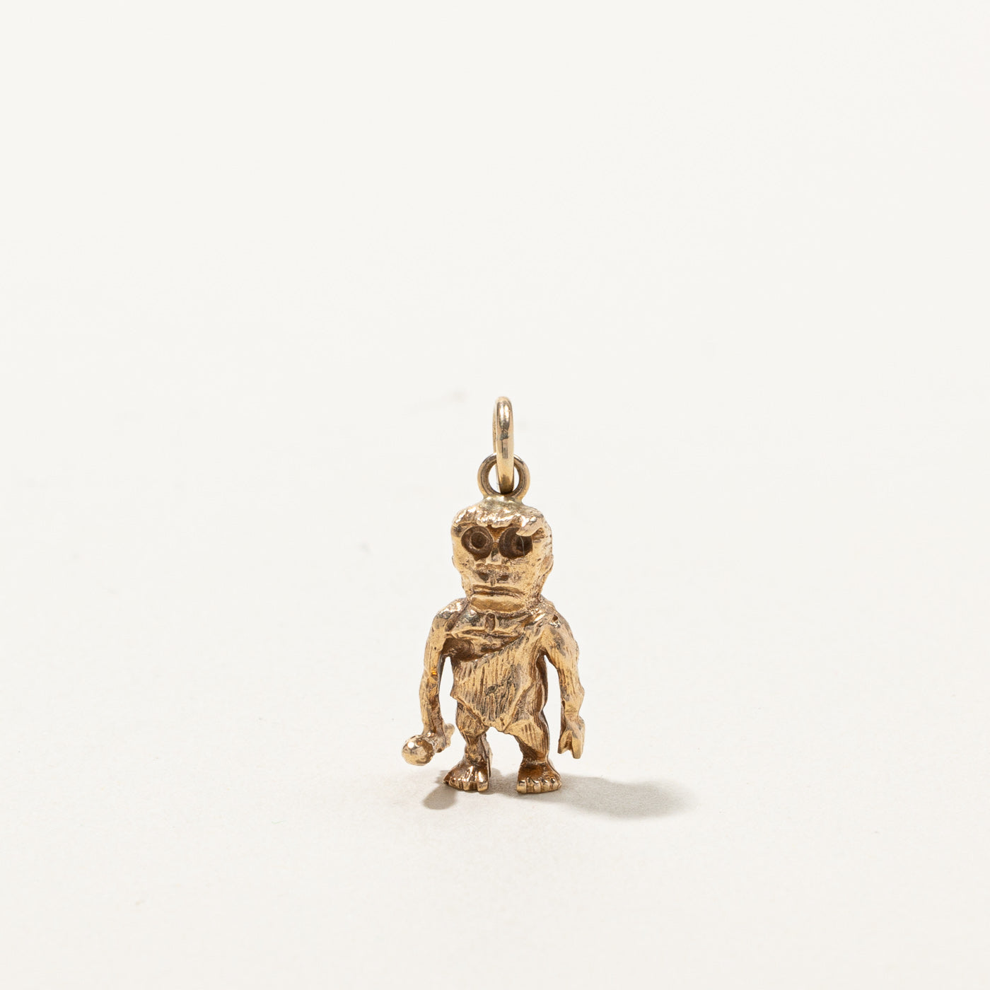 Gold Caveman Charm