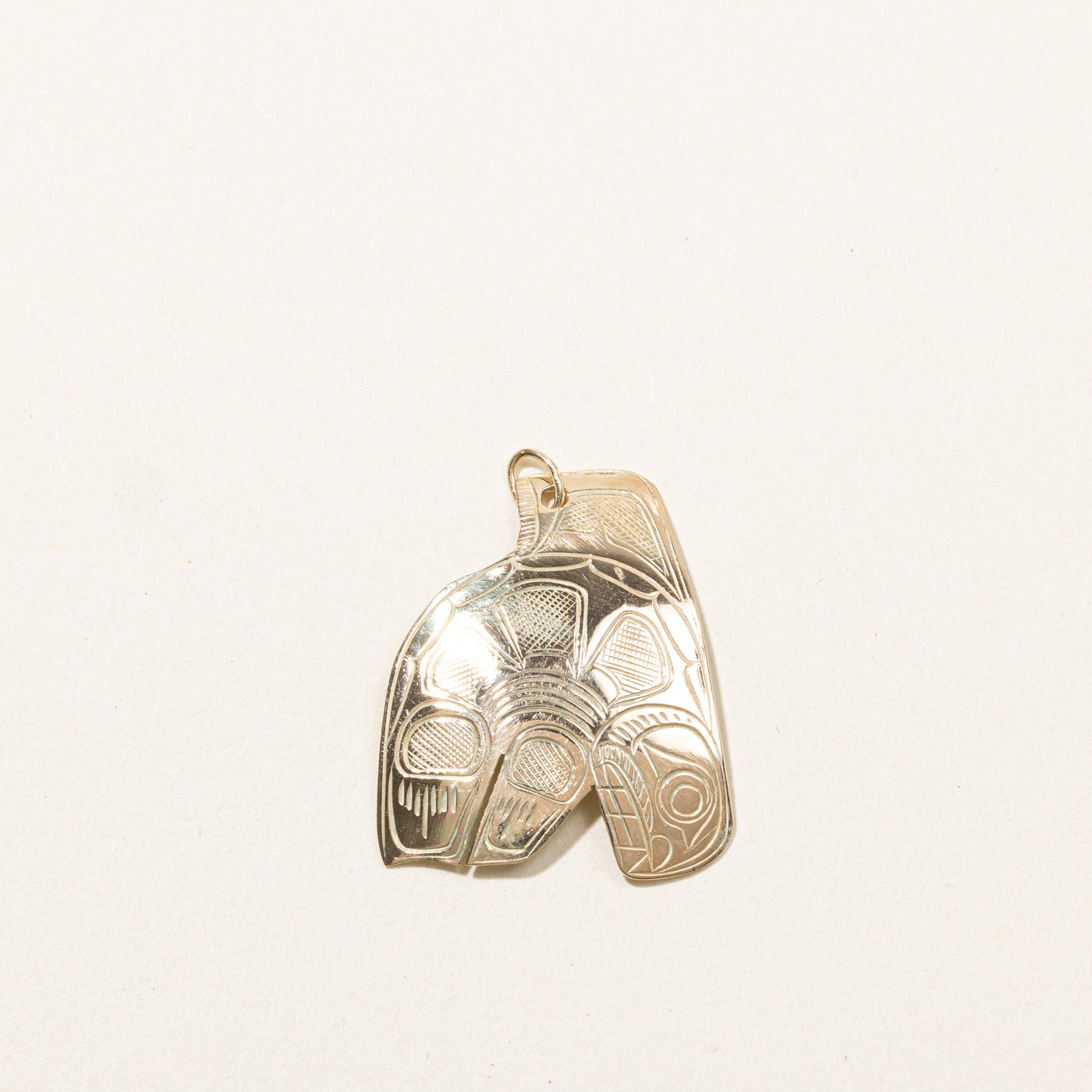 Gold Indigenous Whale Art Pendant