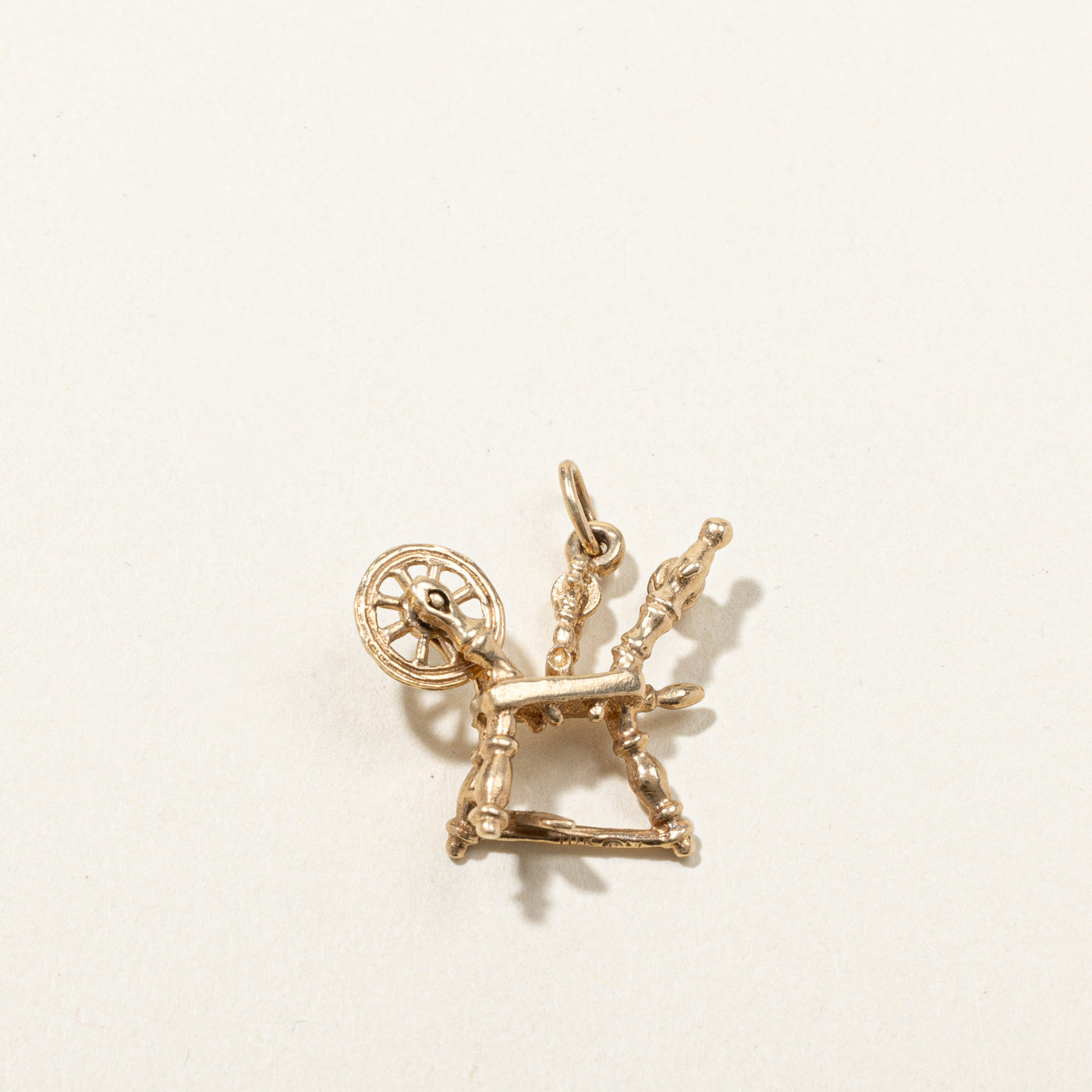 Gold Spinning Wheel Pendant