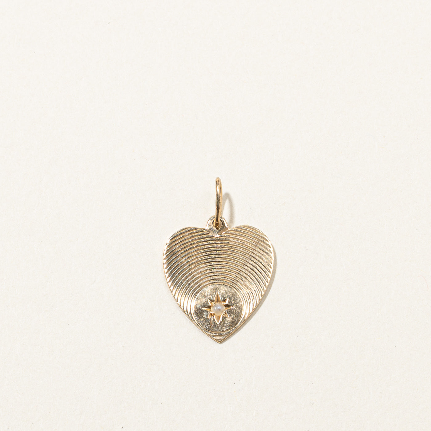 Pendentif cœur en perles fines 
