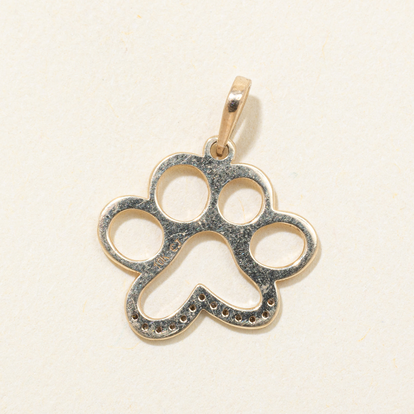 Breloque patte de chien en diamant 10 carats