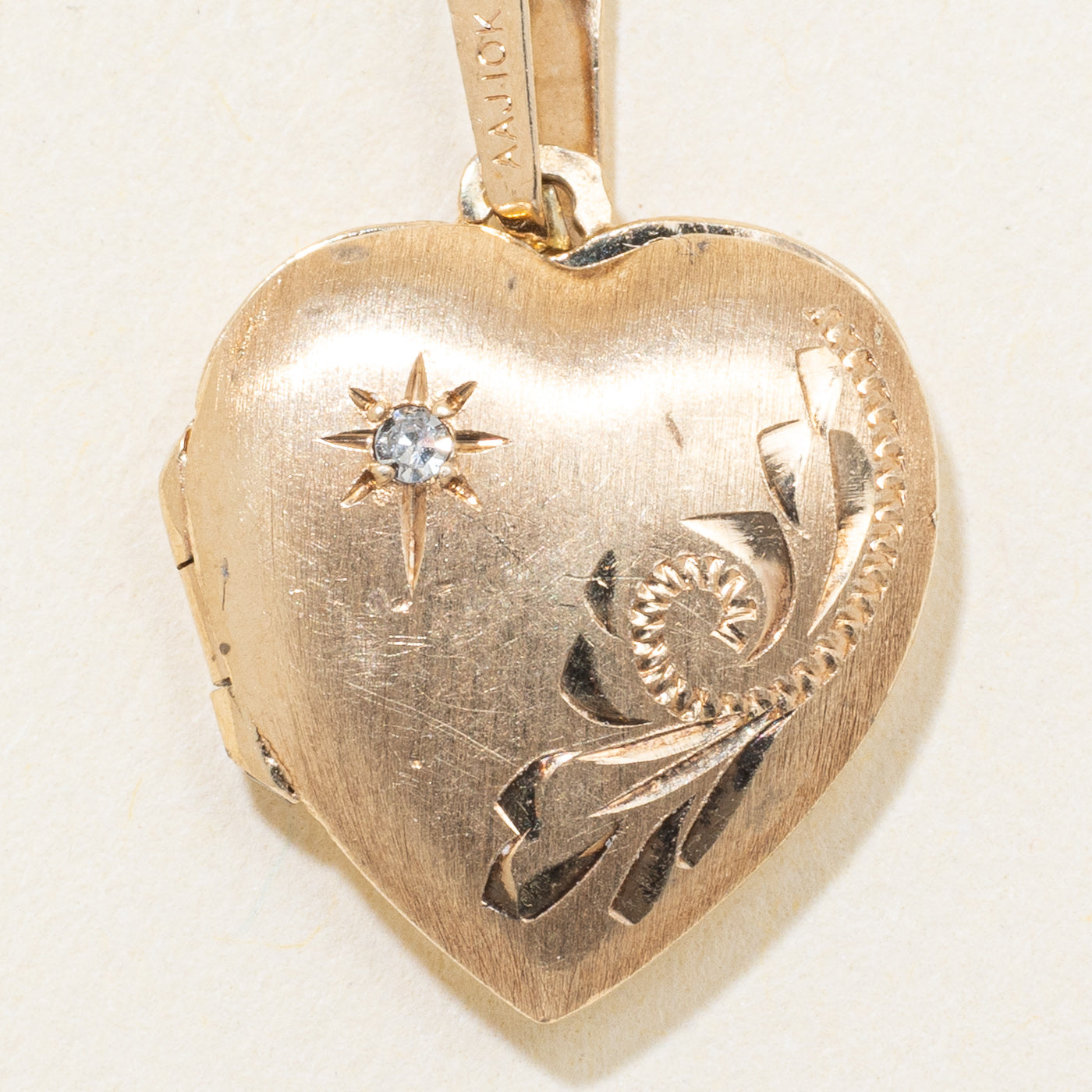 10k Yellow Gold Star Set Diamond Heart Locket
