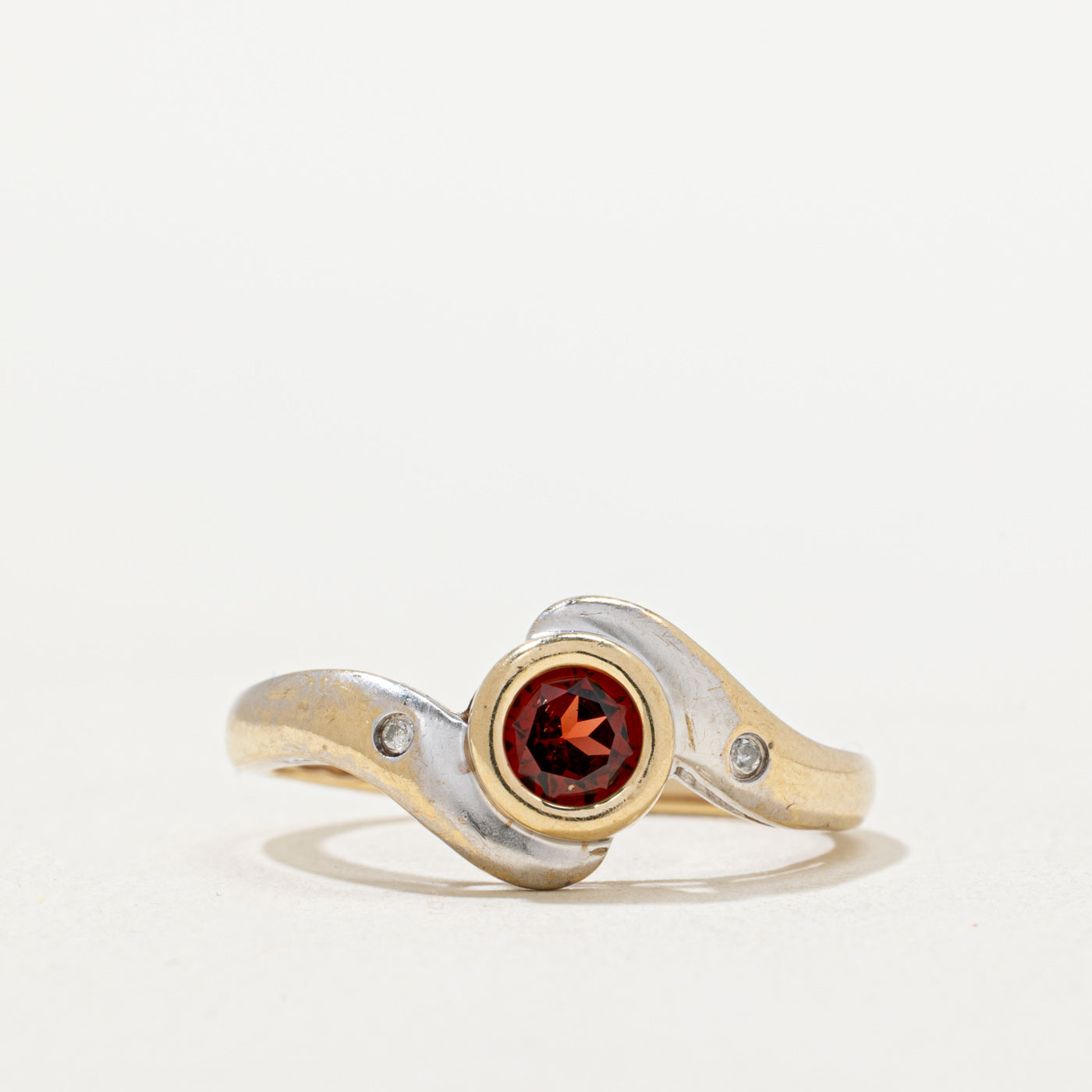 Bezel Set Garnet & Diamond Bypass Ring | 0.50ct, 0.01ctw | SZ 7