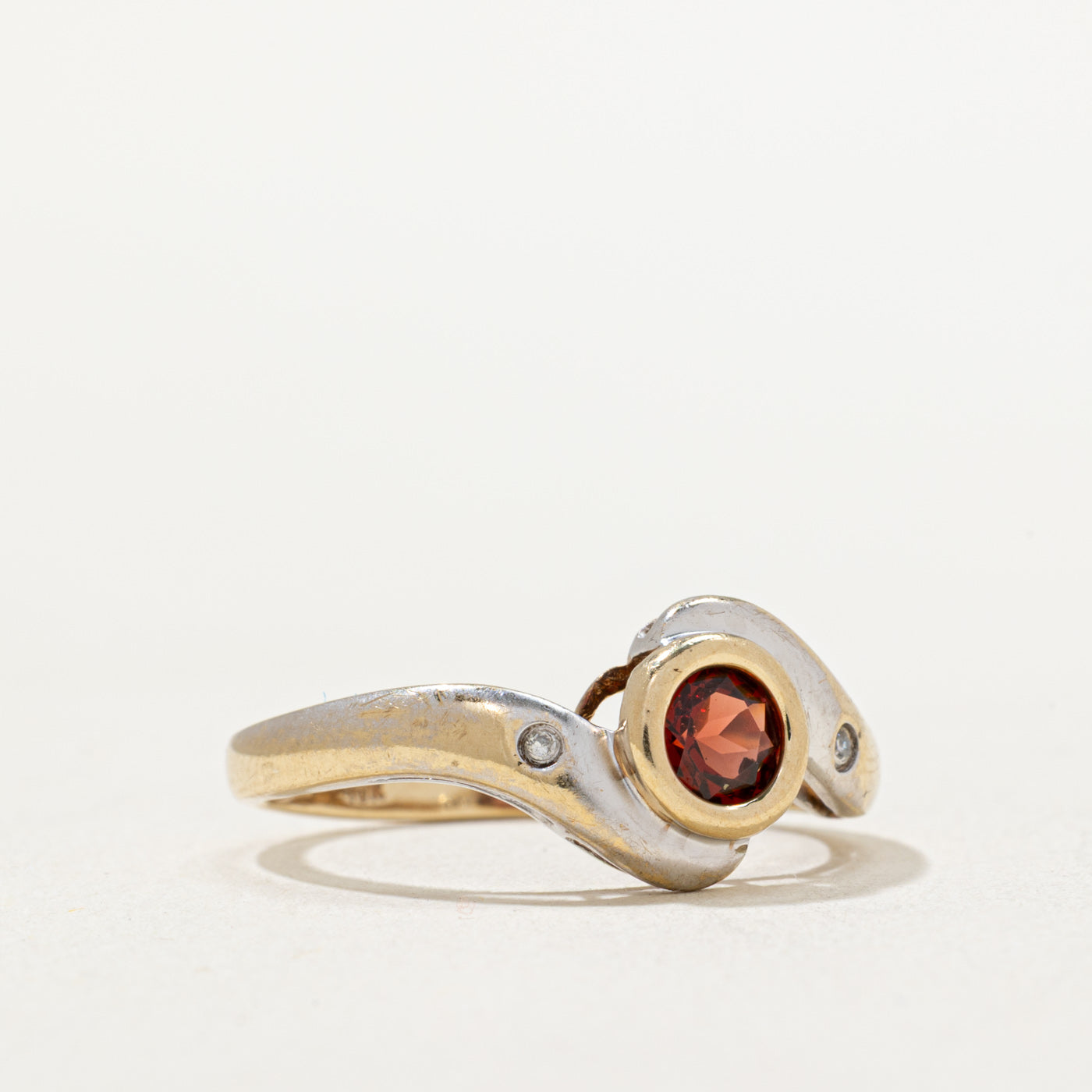Bezel Set Garnet & Diamond Bypass Ring | 0.50ct, 0.01ctw | SZ 7