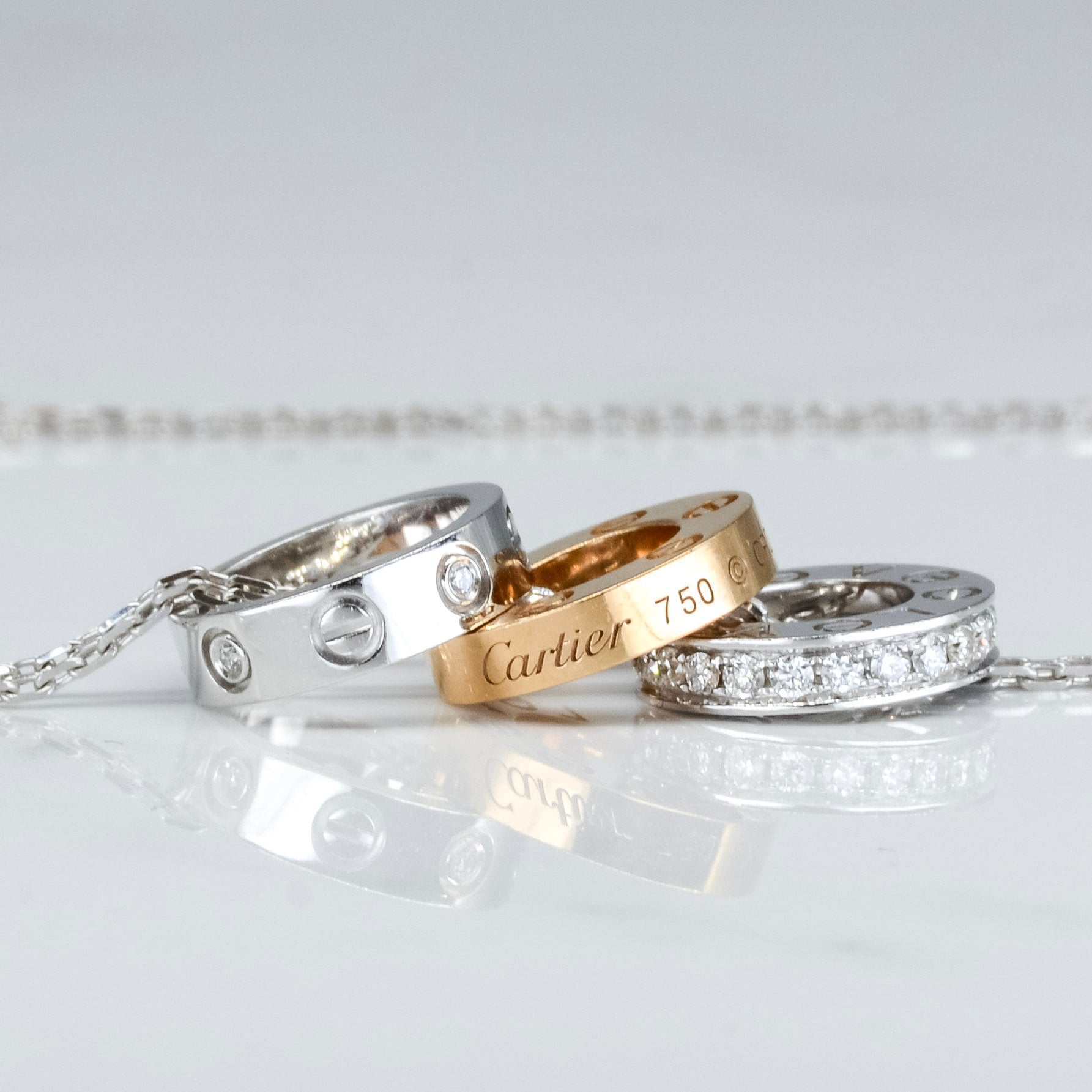 Cartier' Love Triple Disc Diamond Love Necklace | 18.5