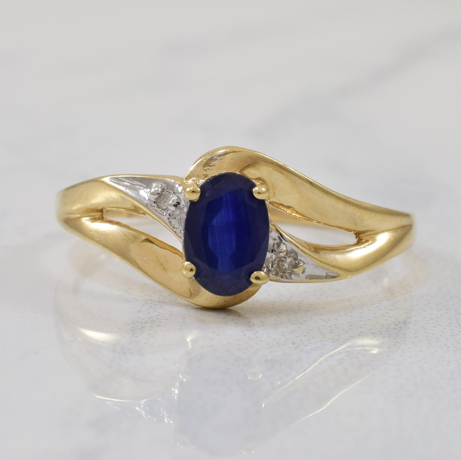 Sapphire & Diamond Split Shank Bypass Ring | 0.64ct, 0.01ctw | SZ 7 |