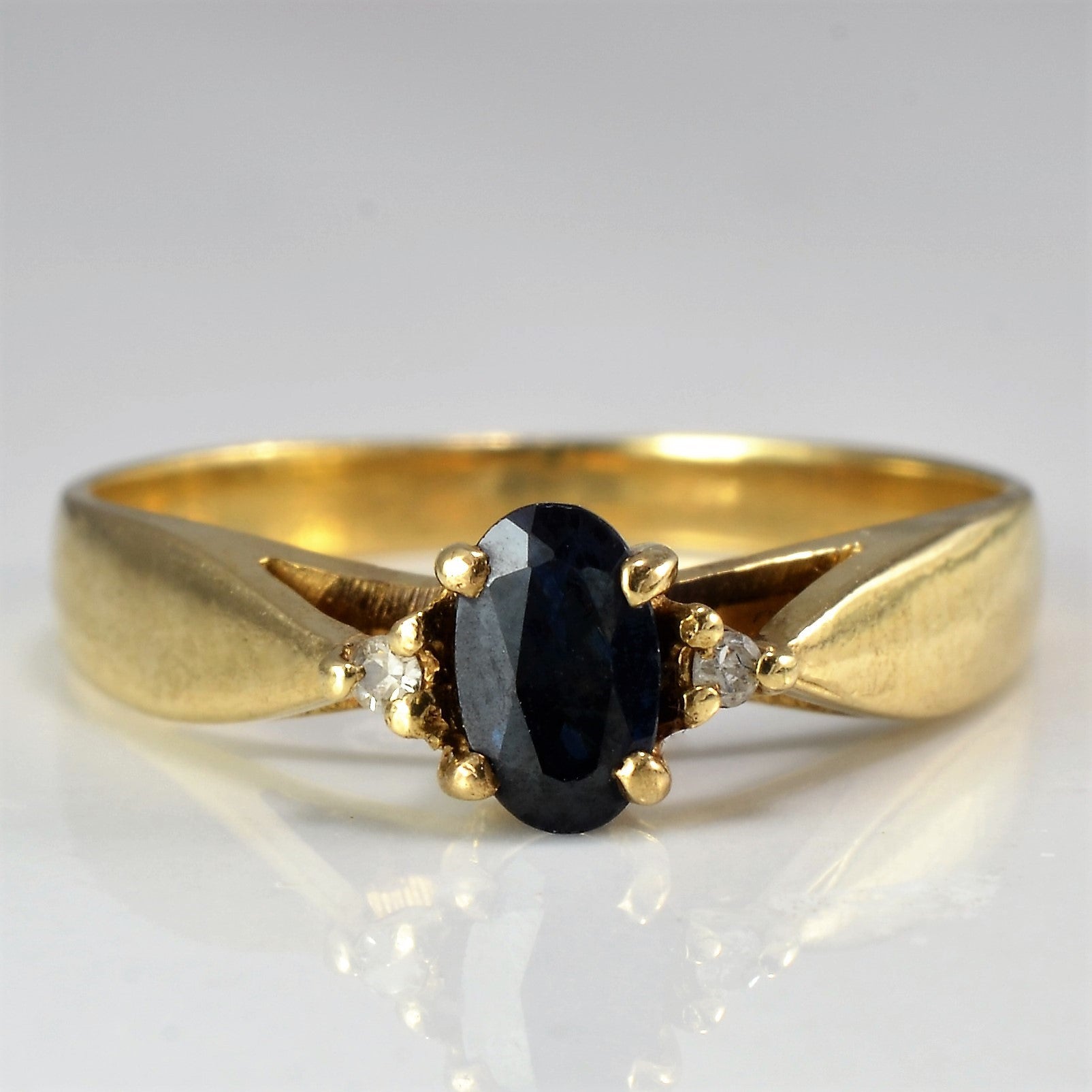Tapered Oval Cut Sapphire Ring | 0.01 ctw, SZ 5.5 |