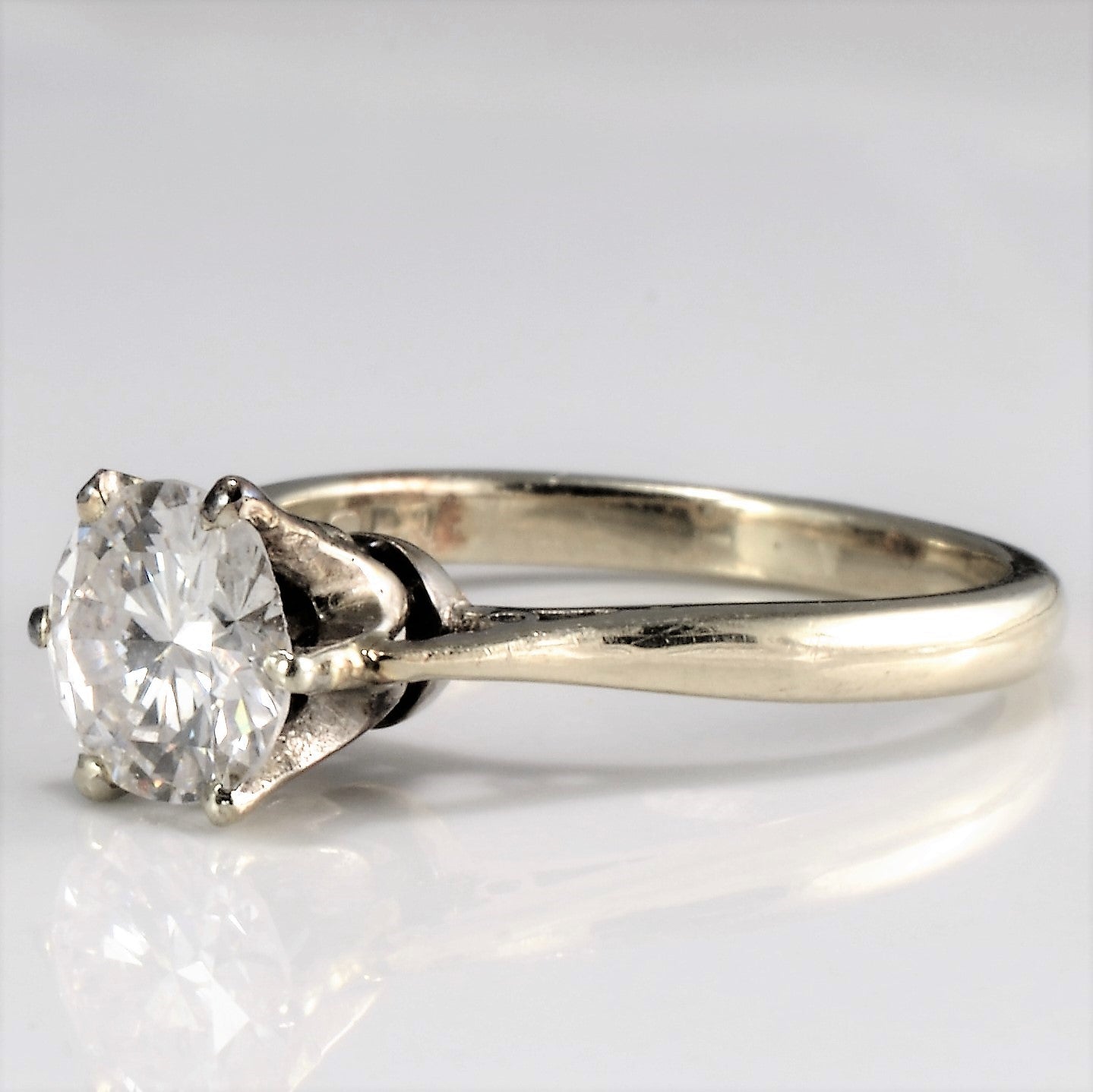 solitaire vintage engagement ring with single cut diamond