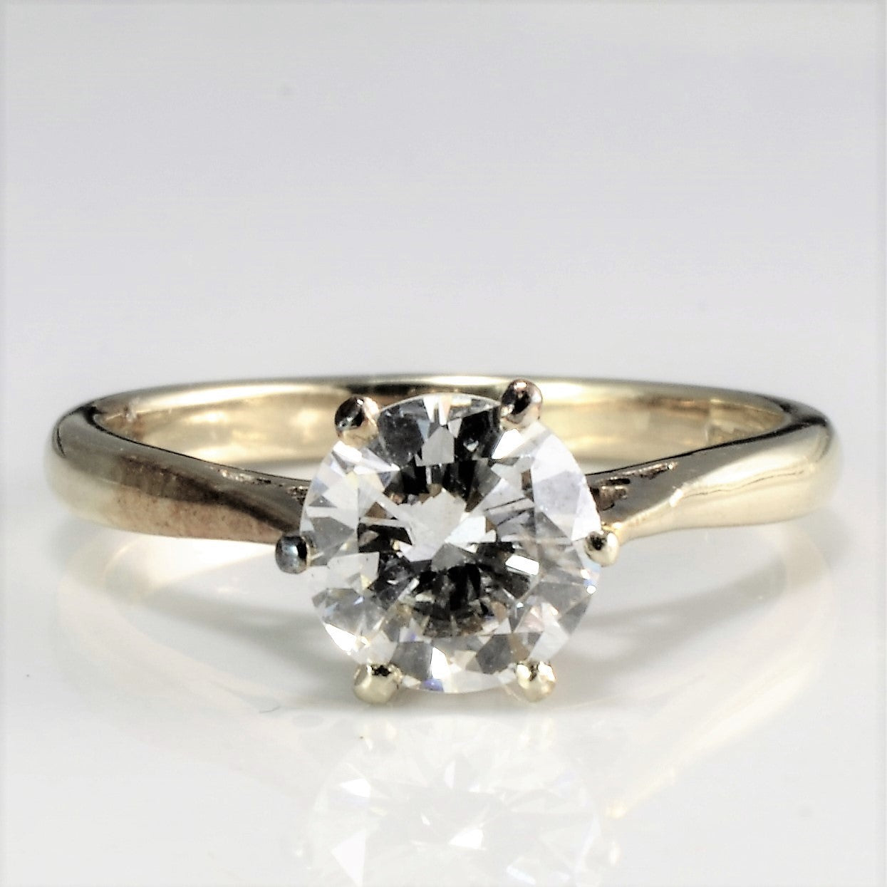 single cut high set vintage engagement ring with single diamond