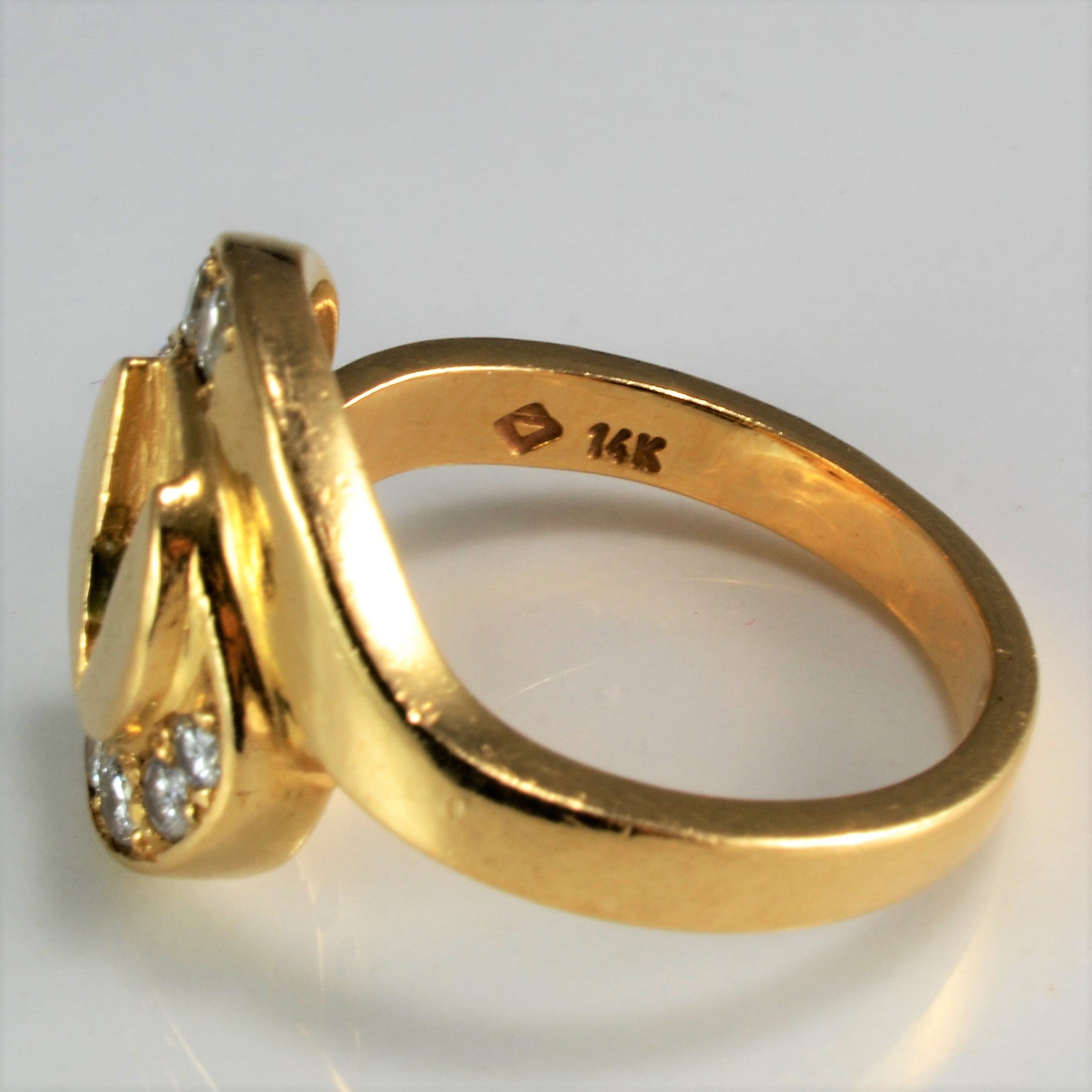 Solid Bypass Diamond & Emerald Ring | 0.24 ctw, SZ 7 |