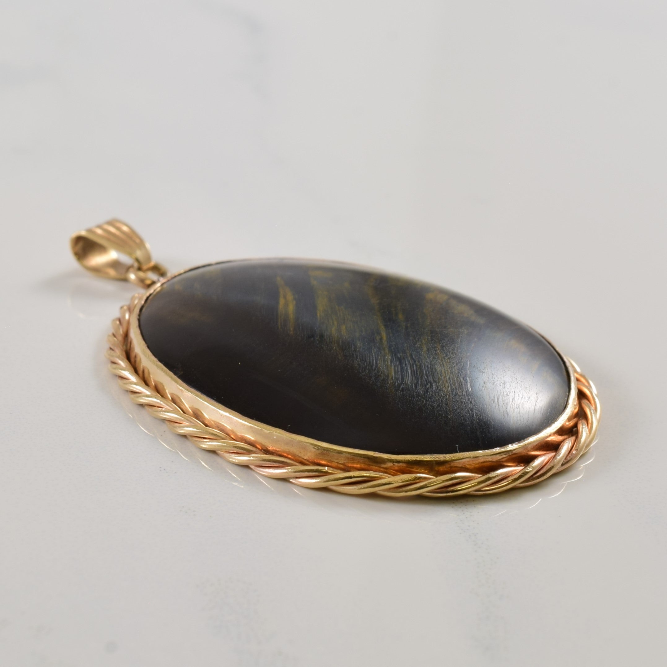 Framed Tiger's Eye Cabochon Pendant | 50.0ct |