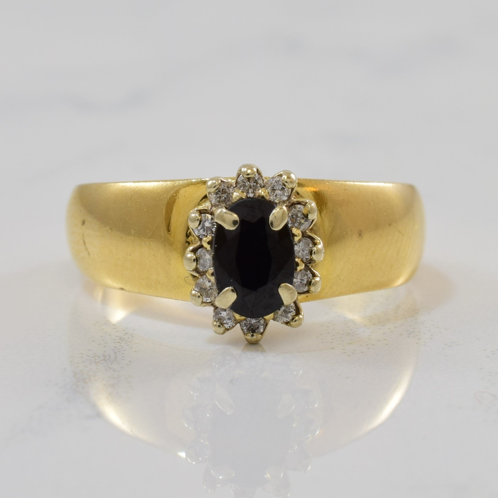 Oval Sapphire & Diamond Halo Ring | 0.60ct, 0.12ctw | SZ 6.5 |