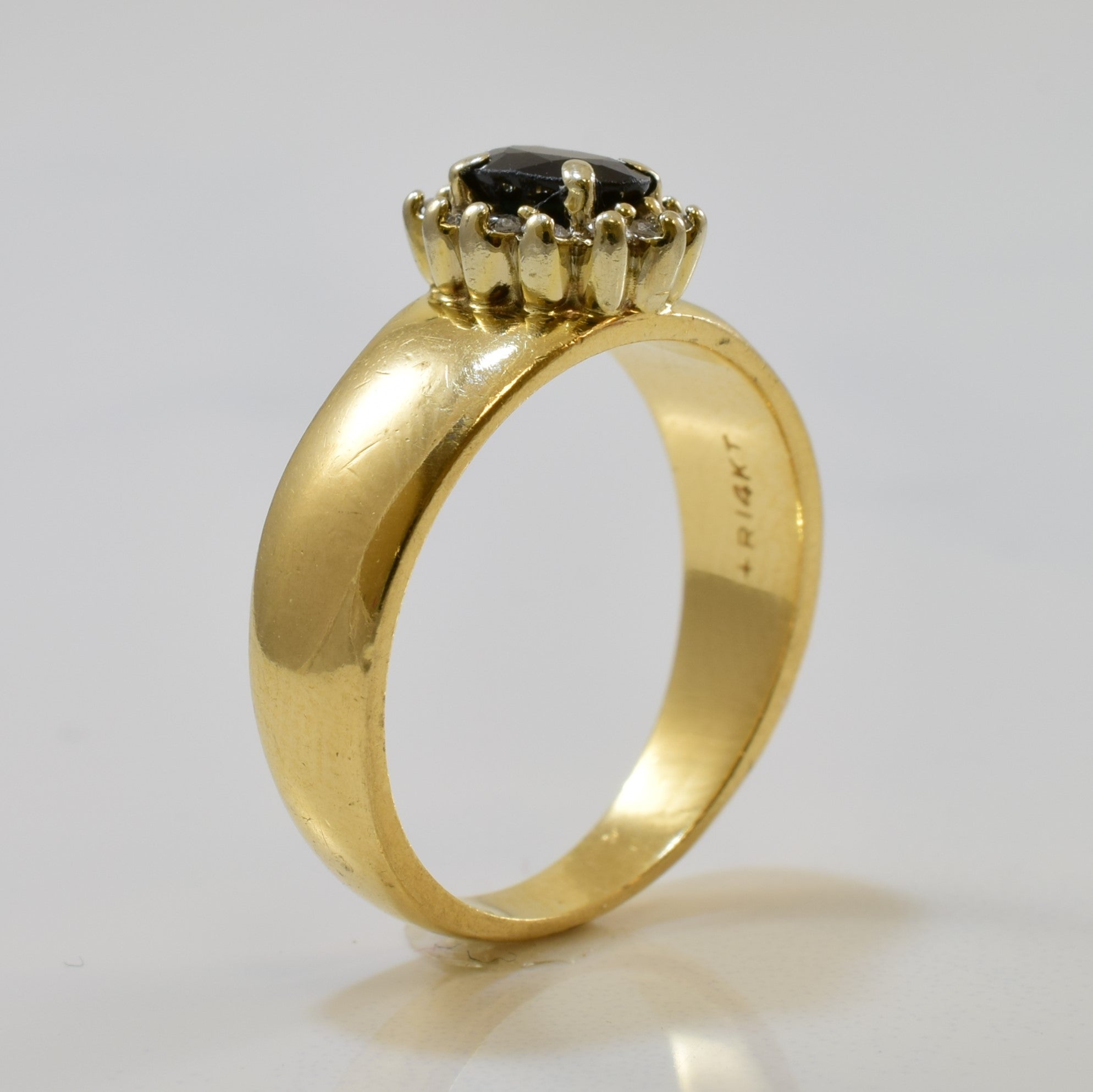 Oval Sapphire & Diamond Halo Ring | 0.60ct, 0.12ctw | SZ 6.5 |