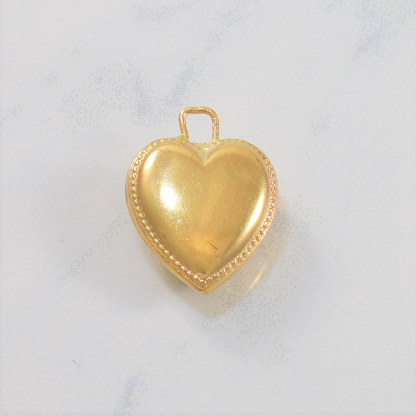 Puffed Heart Emerald & Diamond Pendant | 0.35ct, 1.20ct |