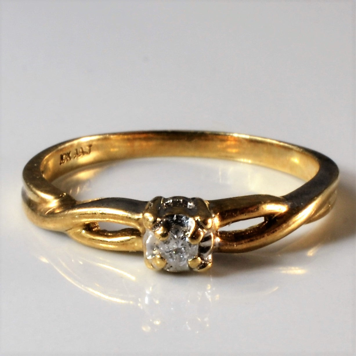 Crossover Solitaire Diamond Ring | 0.04ct | SZ 7 |