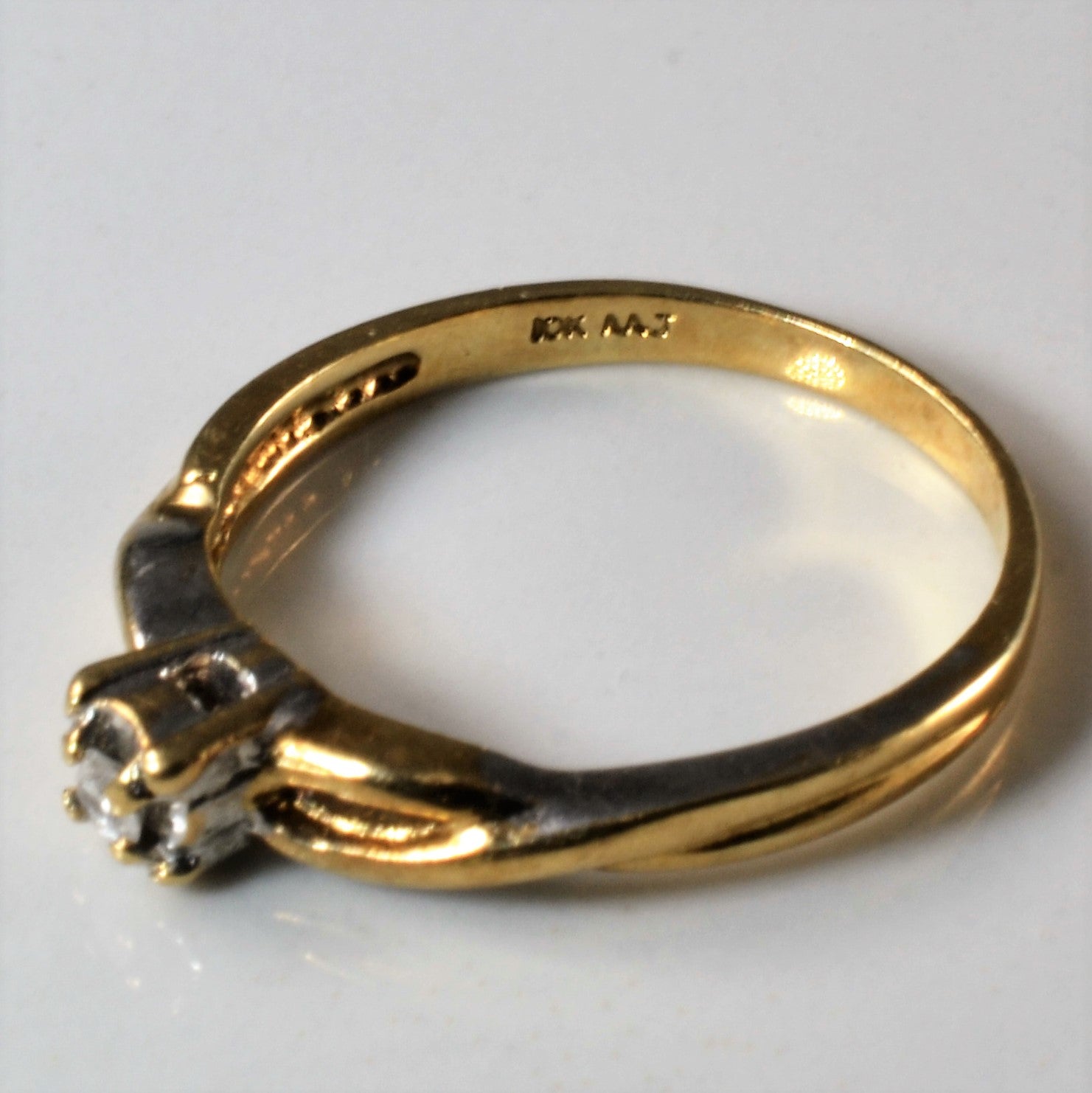 Crossover Solitaire Diamond Ring | 0.04ct | SZ 7 |