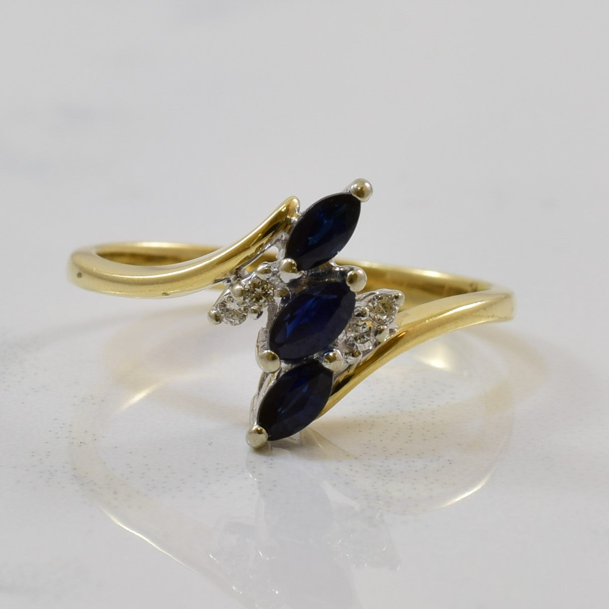 Blue Sapphire & Diamond Bypass Ring | 0.25ctw, 0.04ctw | SZ 6.5 |