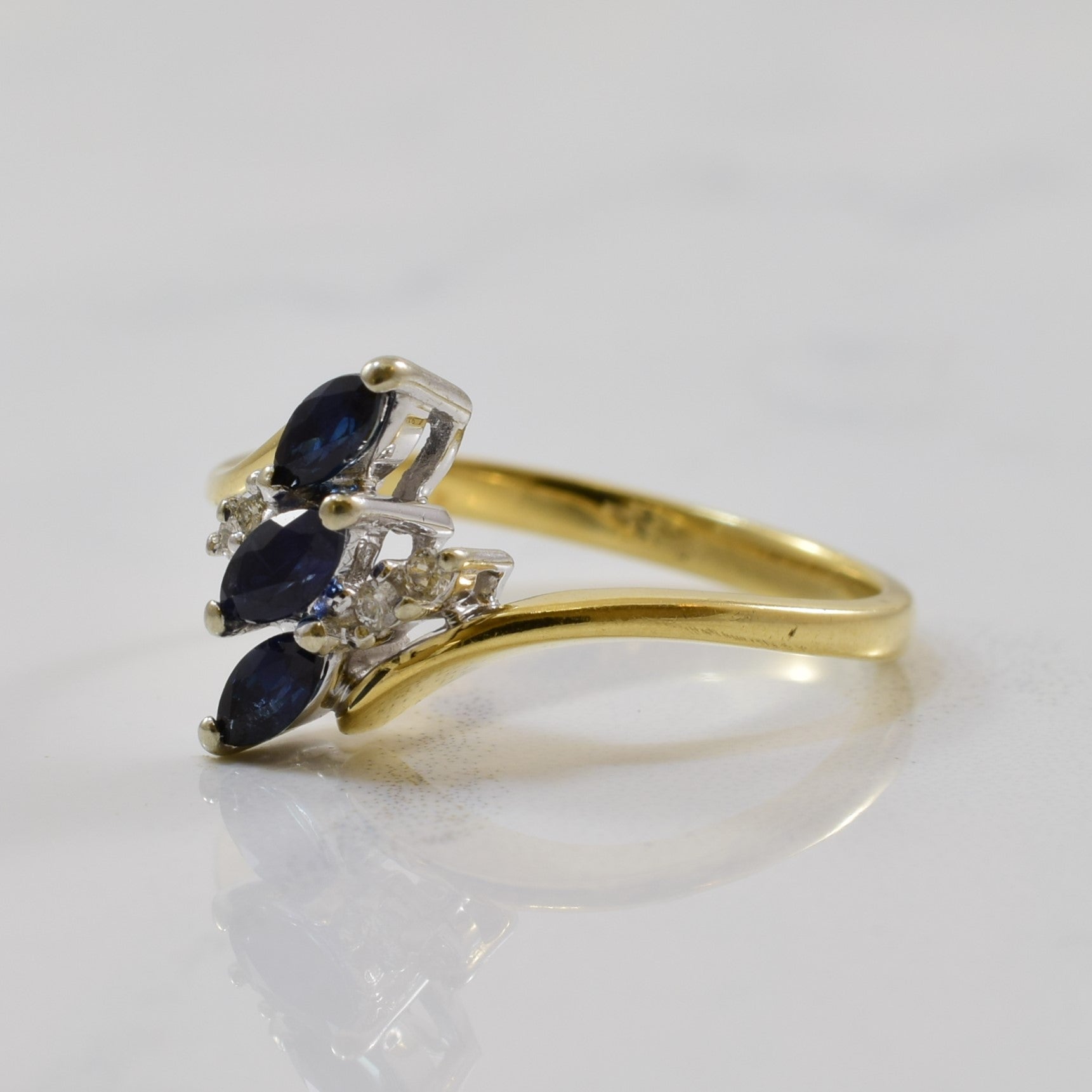 Blue Sapphire & Diamond Bypass Ring | 0.25ctw, 0.04ctw | SZ 6.5 |