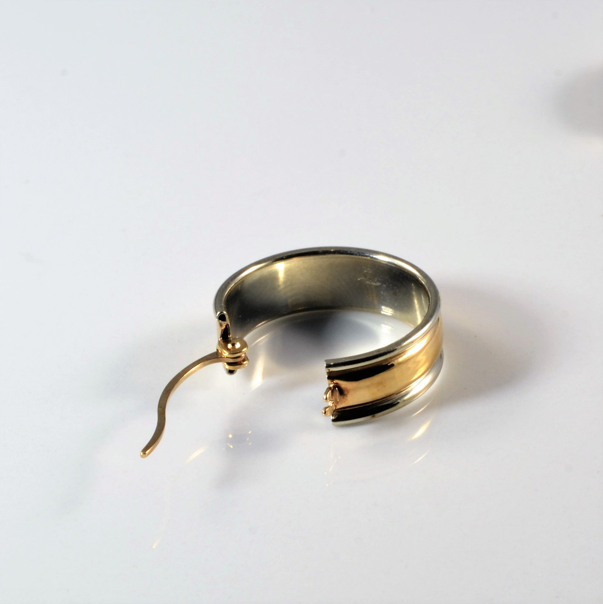 Two Tone Gold Huggie Earrings |