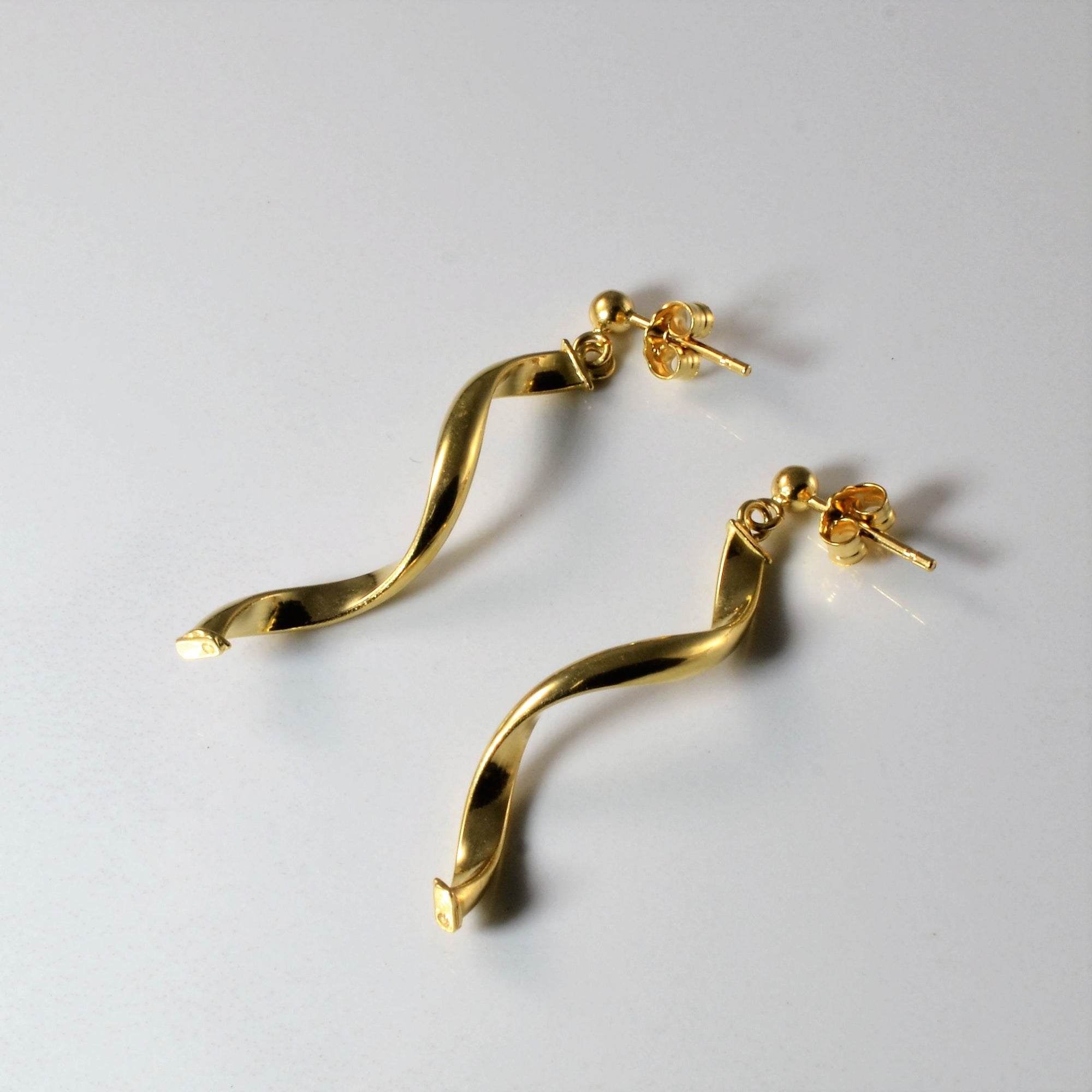 Gold Swirl Drop Earrings |