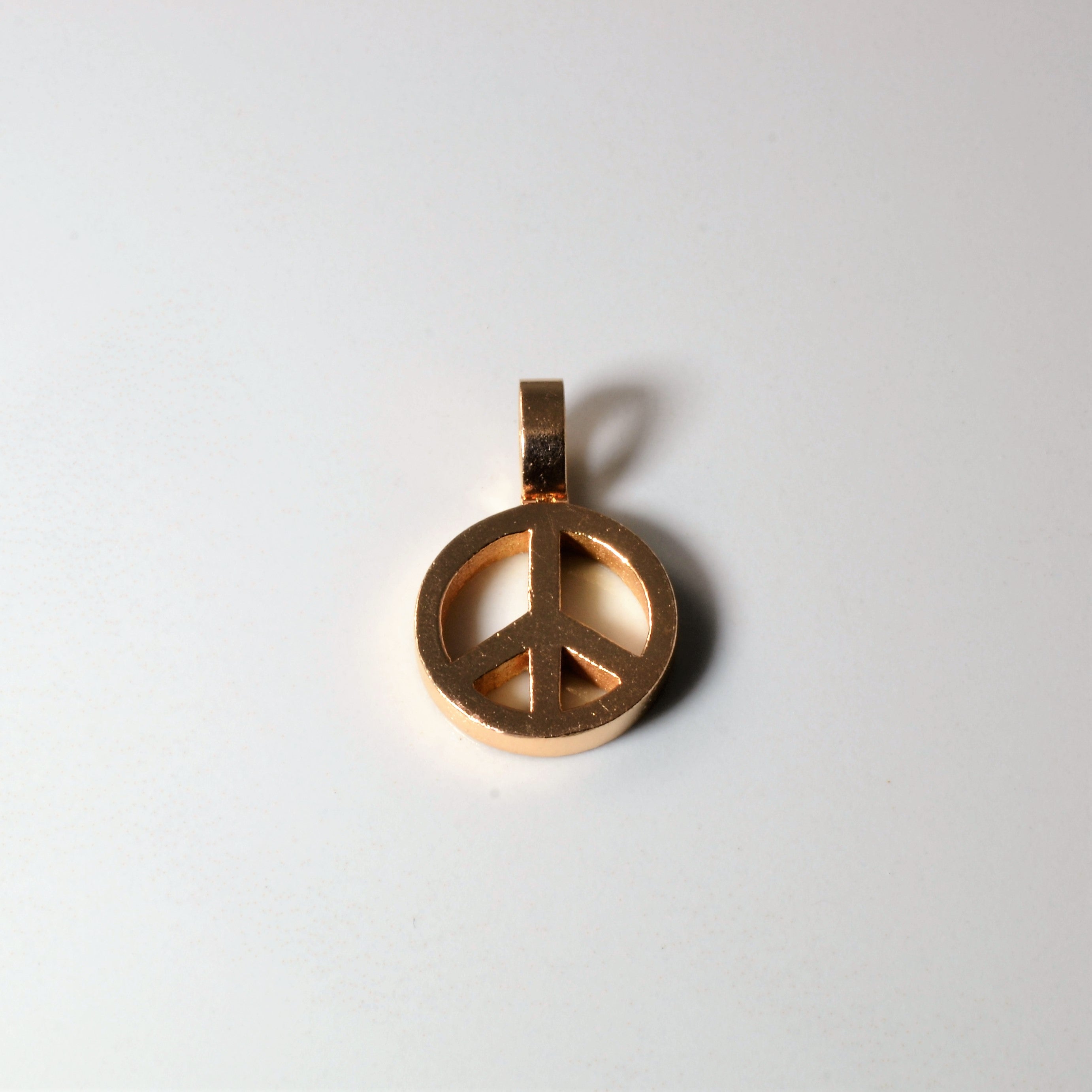 Rose Gold Peace Symbol Pendant |