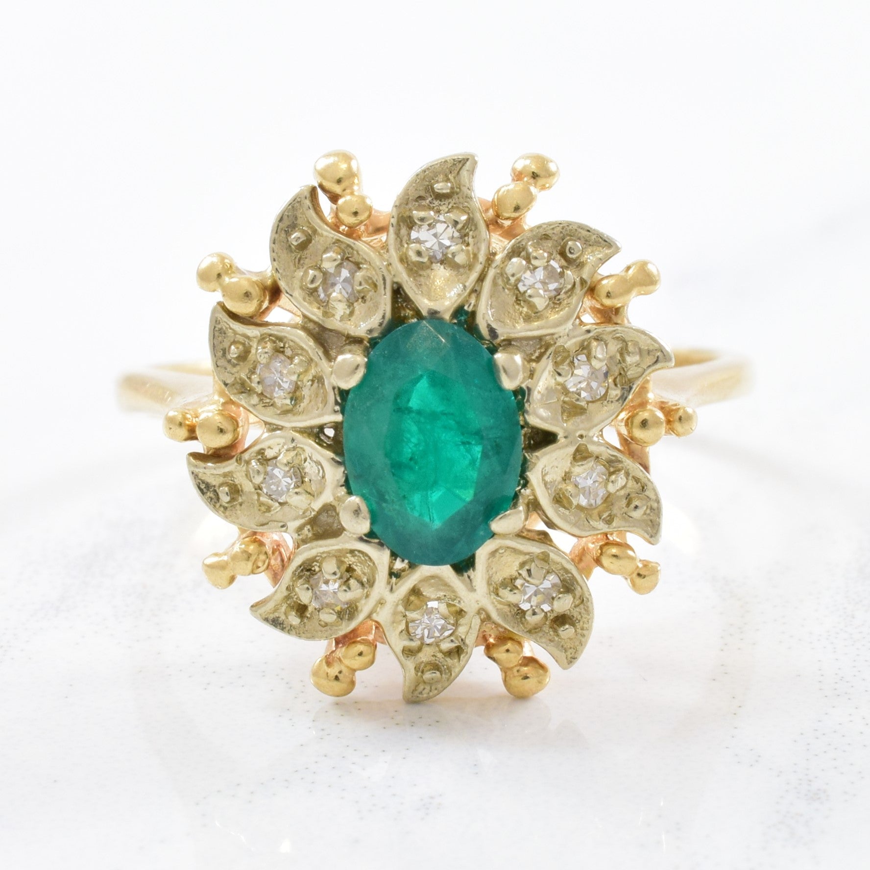 Courtship' Floral Diamond Halo Emerald Ring Circa 1940s | 0.12ctw, 0.55ct | SZ 8 |