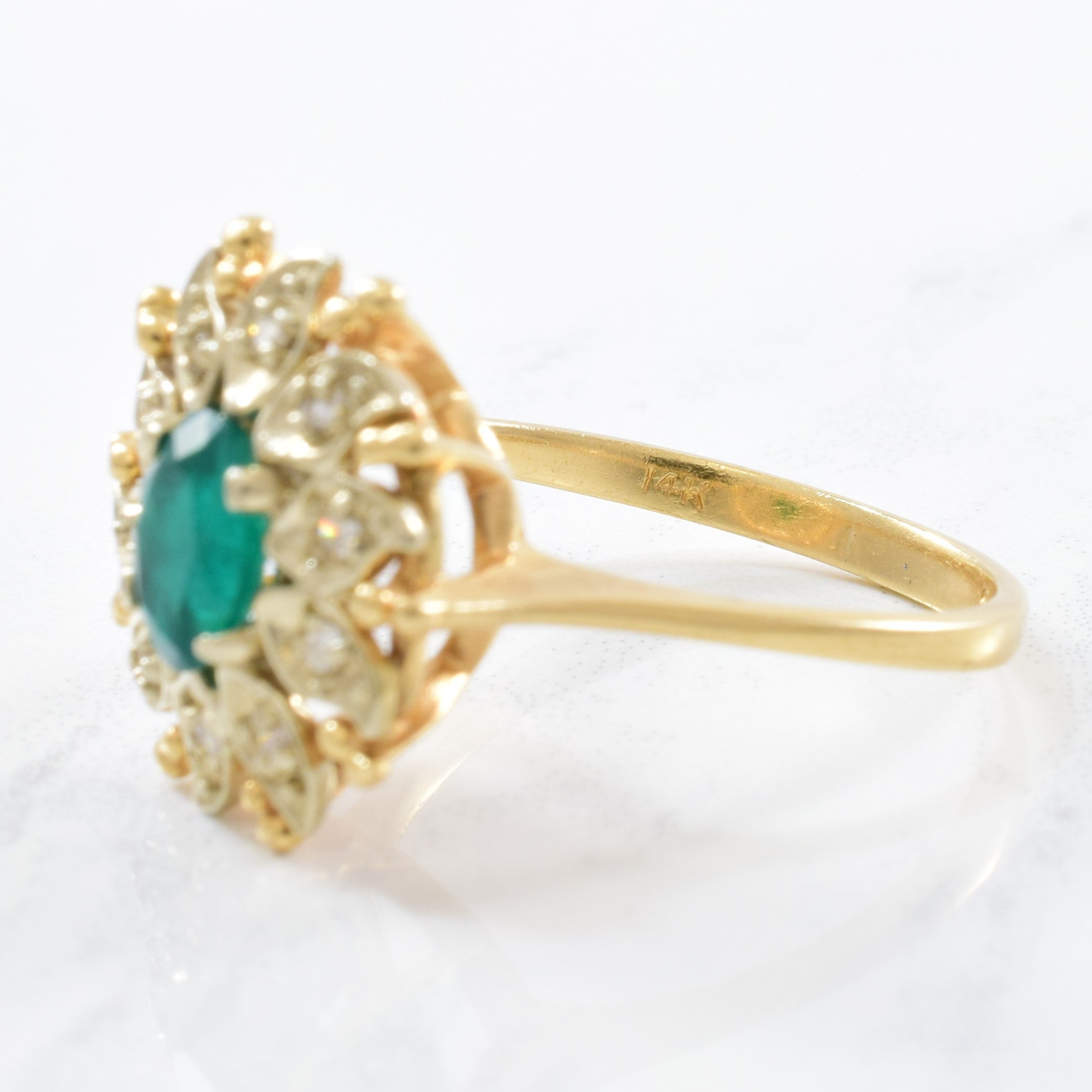 Courtship' Floral Diamond Halo Emerald Ring Circa 1940s | 0.12ctw, 0.55ct | SZ 8 |